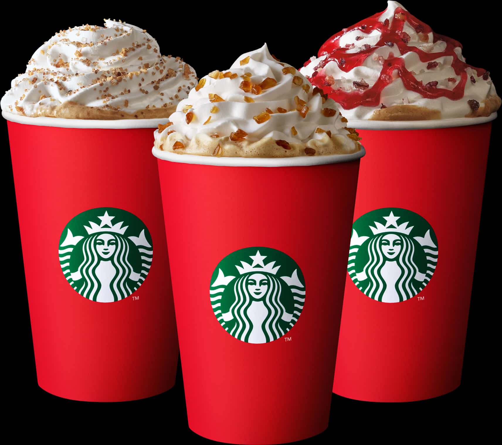 Starbucks Coffee 桌布 壁紙 — 三個紅色Starbucks杯，上面有鮮奶油，襯托黑色背景。
