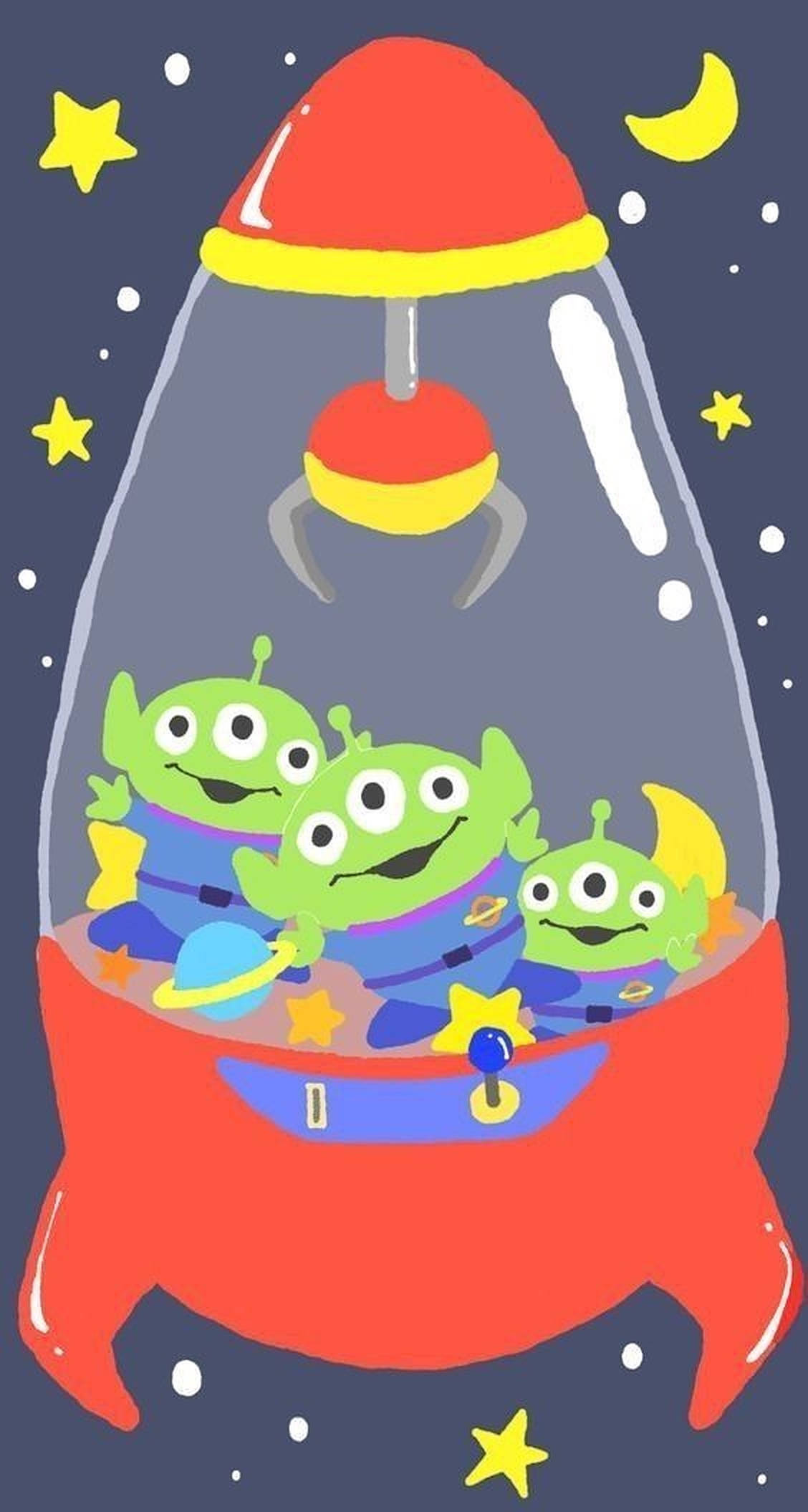 Toy Story Alien 桌布 壁紙 — 三個綠色外星人玩具在一個紅色火箭形狀的糖果機內，背景是星空夜晚。
