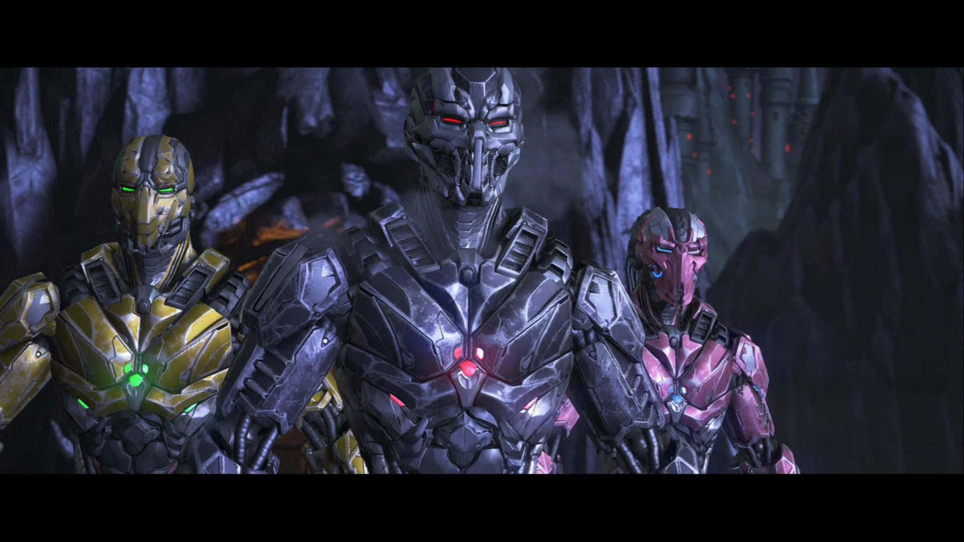 Mortal Kombat Triborg 桌布 壁紙 — 三個裝甲機械戰士，眼睛發光，站在一個黑暗的洞穴般的環境中。