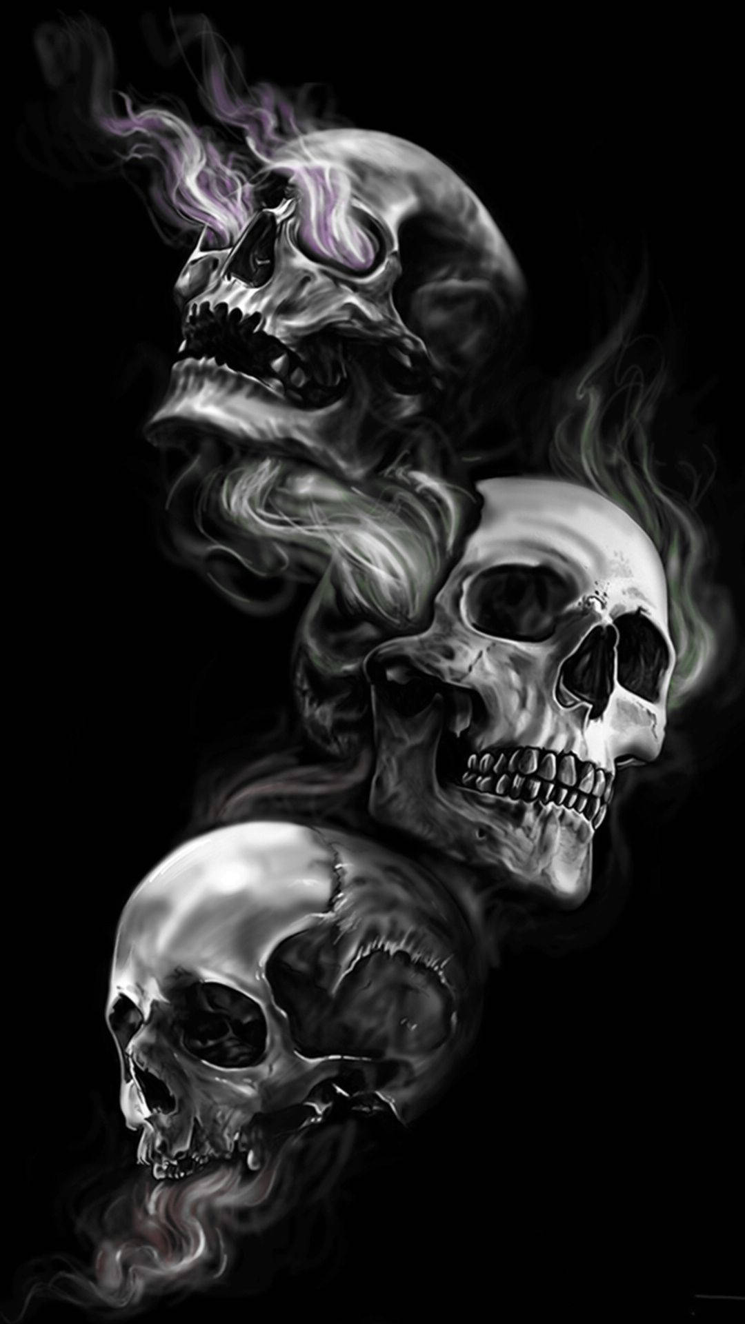 超殺 桌布 壁紙 — 三個詳細的頭骨垂直漂浮在黑色背景上，帶有旋轉的煙霧和紫色火焰點綴。