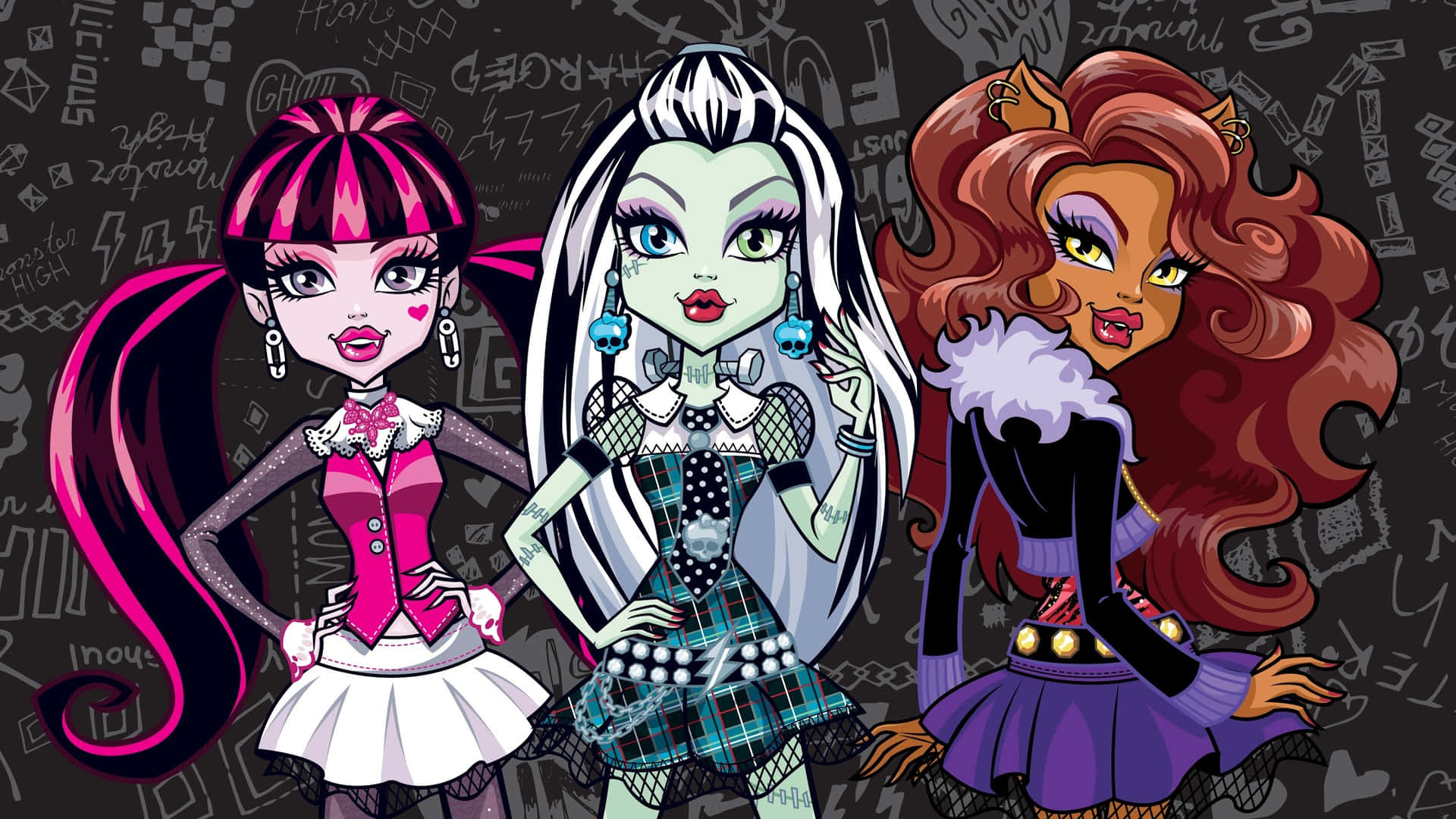 Monster High 桌布 壁紙 — 三個風格化的怪物女孩，擁有鮮豔的頭髮和哥德式服裝，自信地在塗鴉覆蓋的牆前擺姿勢。