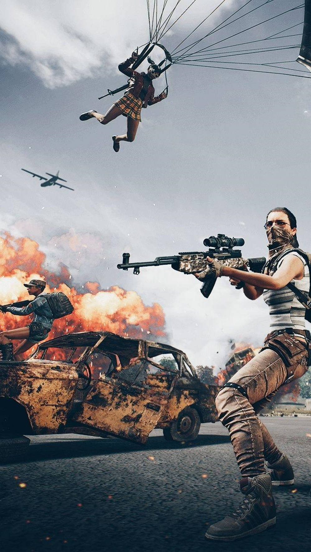 pubg mobile 桌布 壁紙 — 三名武裝玩家身穿戰鬥裝備，通過降落傘下降並騎乘燃燒的殘骸，呈現混亂的大逃殺場景。