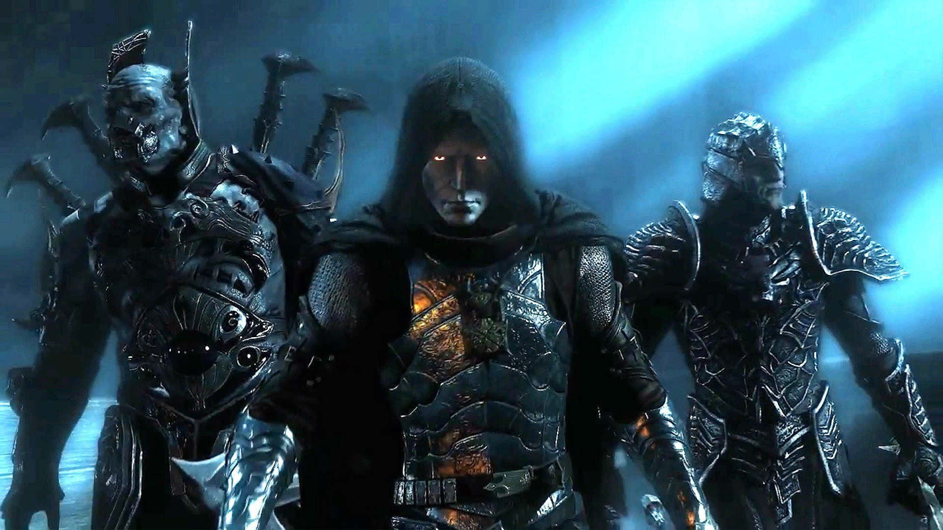 Shadow Of Mordor 桌布 壁紙 — 三名身穿盔甲、眼睛發光的奇幻戰士，在暗藍色迷霧環境中威嚴地站立。