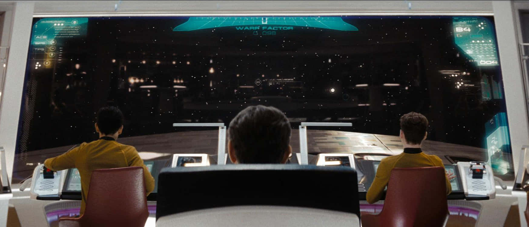 三名身穿黃色制服的船員在星艦艦橋上觀看星星。 — 星際爭霸戰 GIF 壁紙