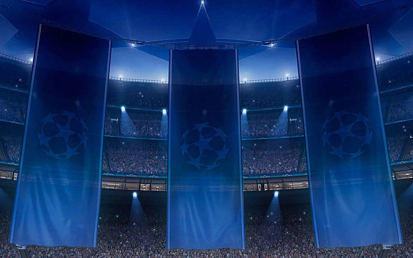 Uefa Champions League 桌布 壁紙 — 三幅帶有UEFA Champions League標誌的巨大藍色橫幅在擠滿觀眾的體育館中，在戲劇性的聚光燈下懸掛。