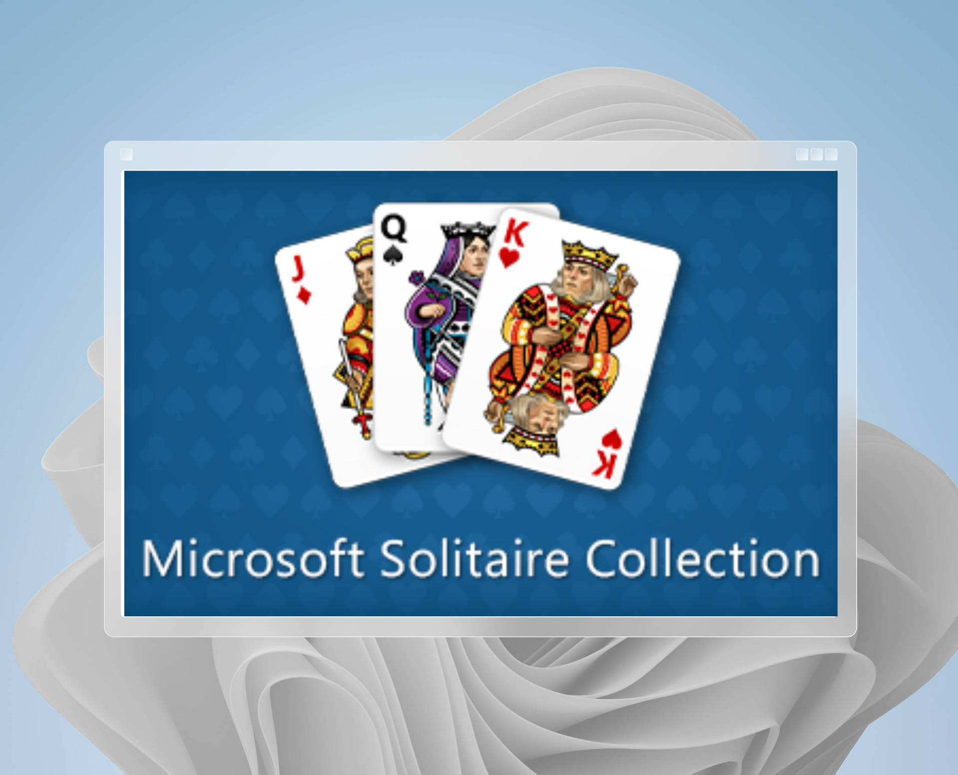 三張撲克牌傑克皇后國王顯示在一個標有Microsoft Solitaire Collection的遊戲視窗中。 — Microsoft 壁紙