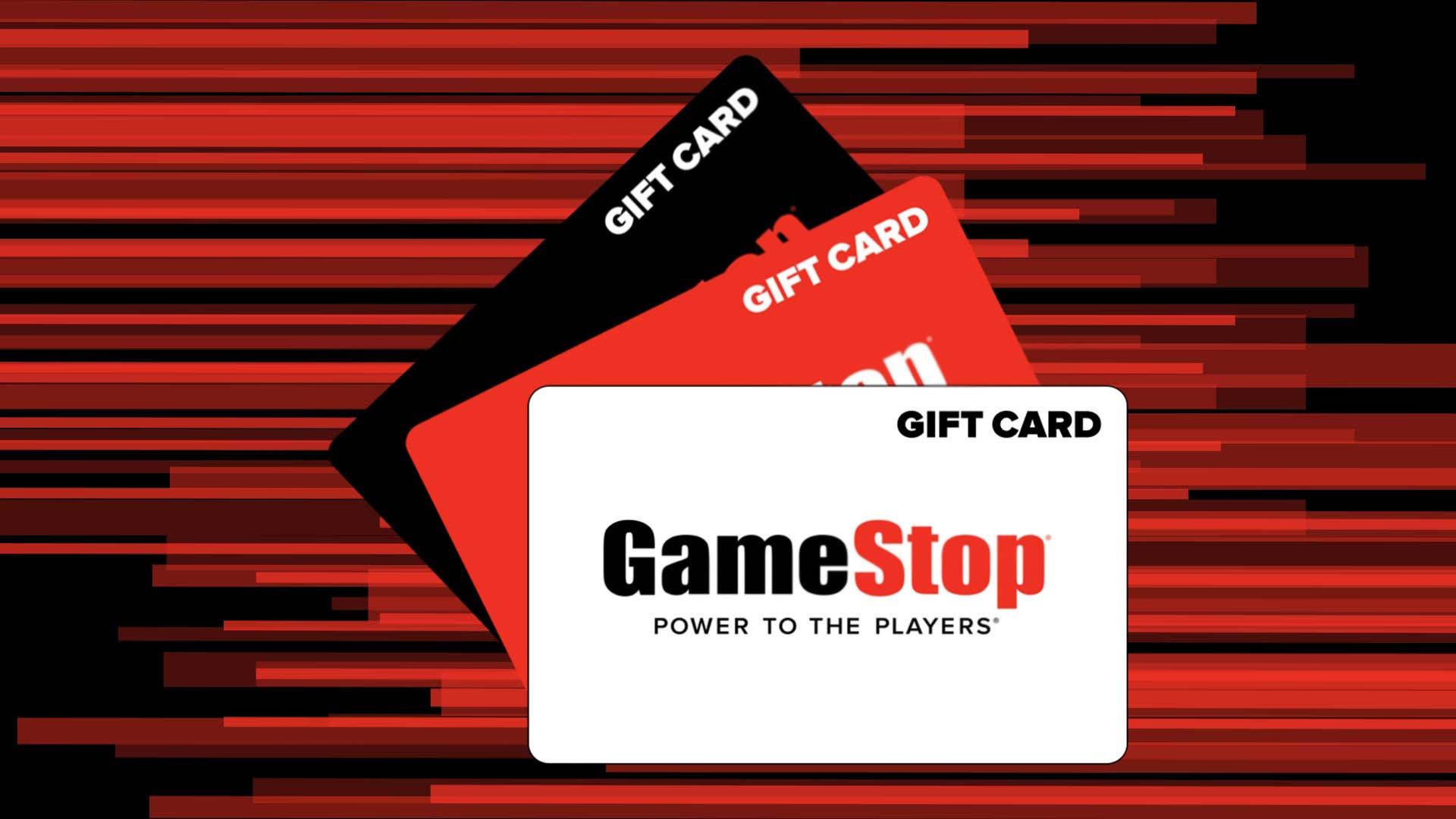GameStop 桌布 壁紙 — 三張黑色、紅色和白色的 GameStop 禮品卡放在充滿動感的紅黑條紋背景上。