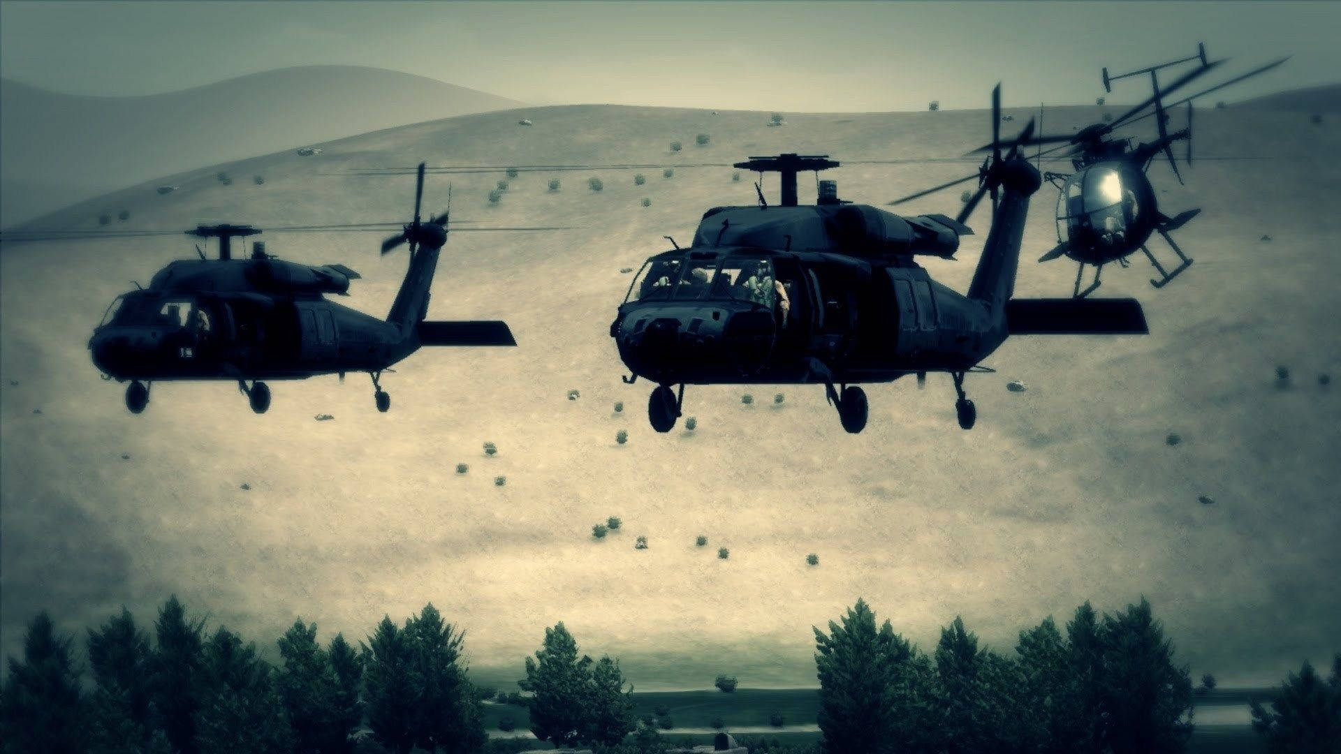 Black Hawk Helicopter 桌布 壁紙 — 三架軍用直升機低飛過一片荒蕪的地景，散佈炸彈，前景有樹木排列。