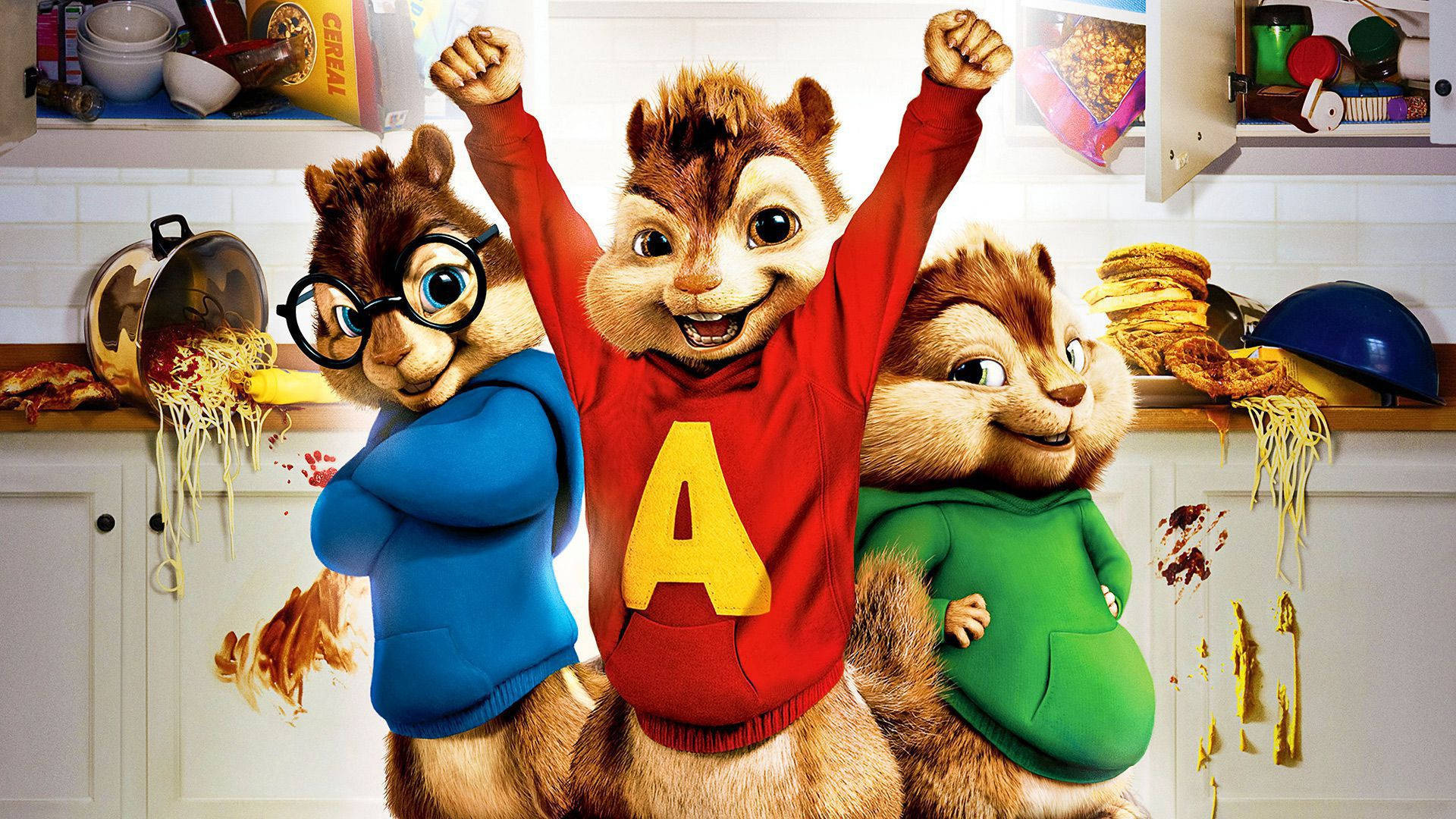 Chipmunks 桌布 壁紙 — 三隻動畫花栗鼠在到處都是義大利麵的凌亂廚房裡慶祝。