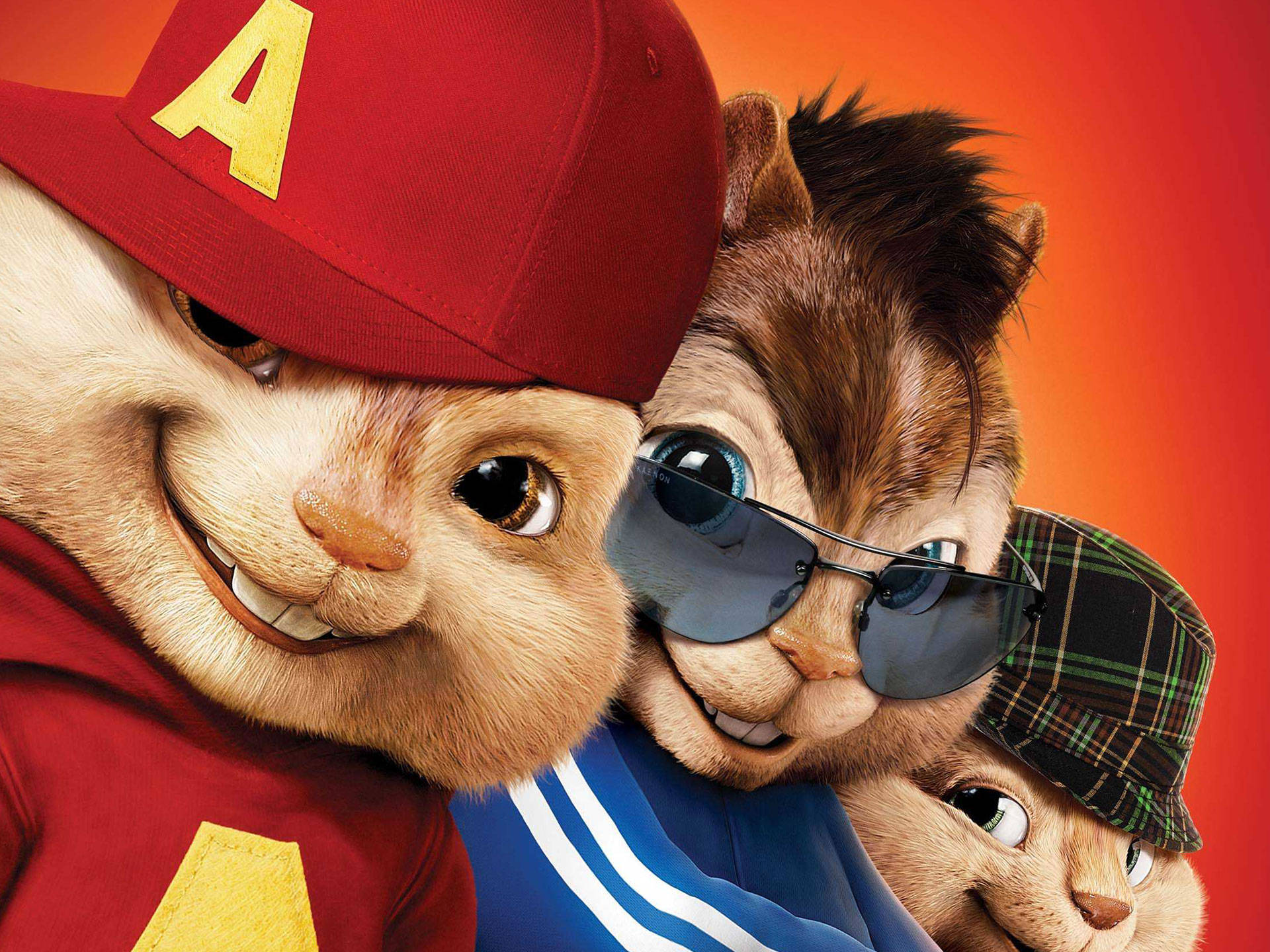 Chipmunks 桌布 壁紙 — 三隻動畫花栗鼠穿著嘻哈服裝，在火橙色背景下咧嘴笑。