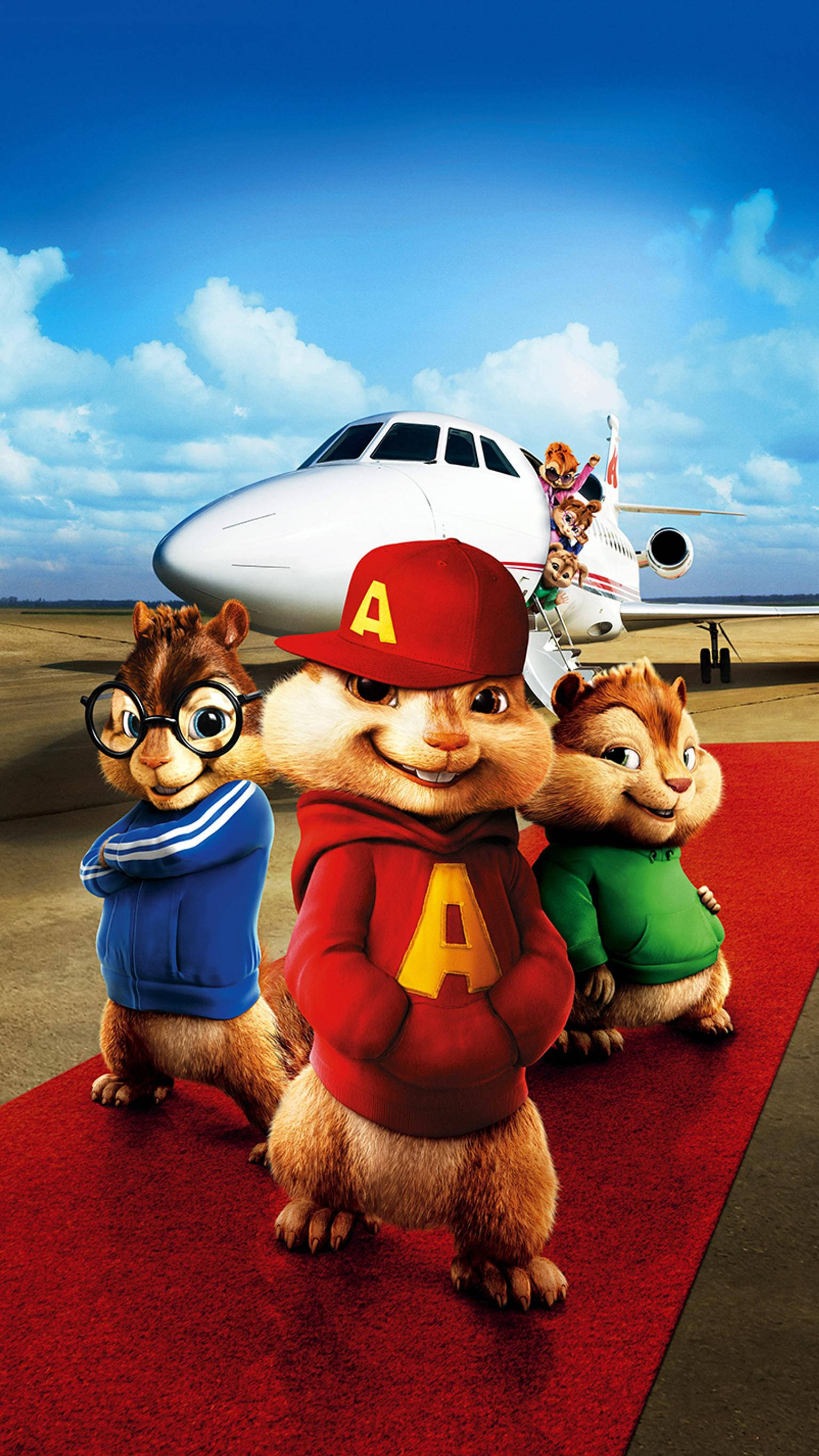 Chipmunks 桌布 壁紙 — 三隻動畫花栗鼠穿著色彩繽紛的服裝，站在私人飛機前的紅地毯上，背景是明亮的藍天。