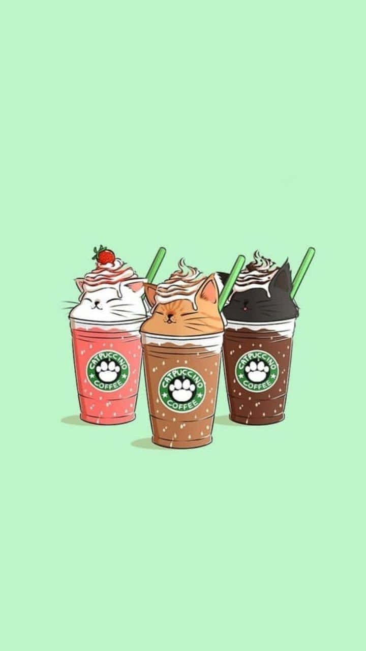 Aesthetic Starbucks 桌布 壁紙 — 三隻卡通貓咪從冰咖啡杯中探出頭來，杯中有鮮奶油和吸管，背景是薄荷綠色。