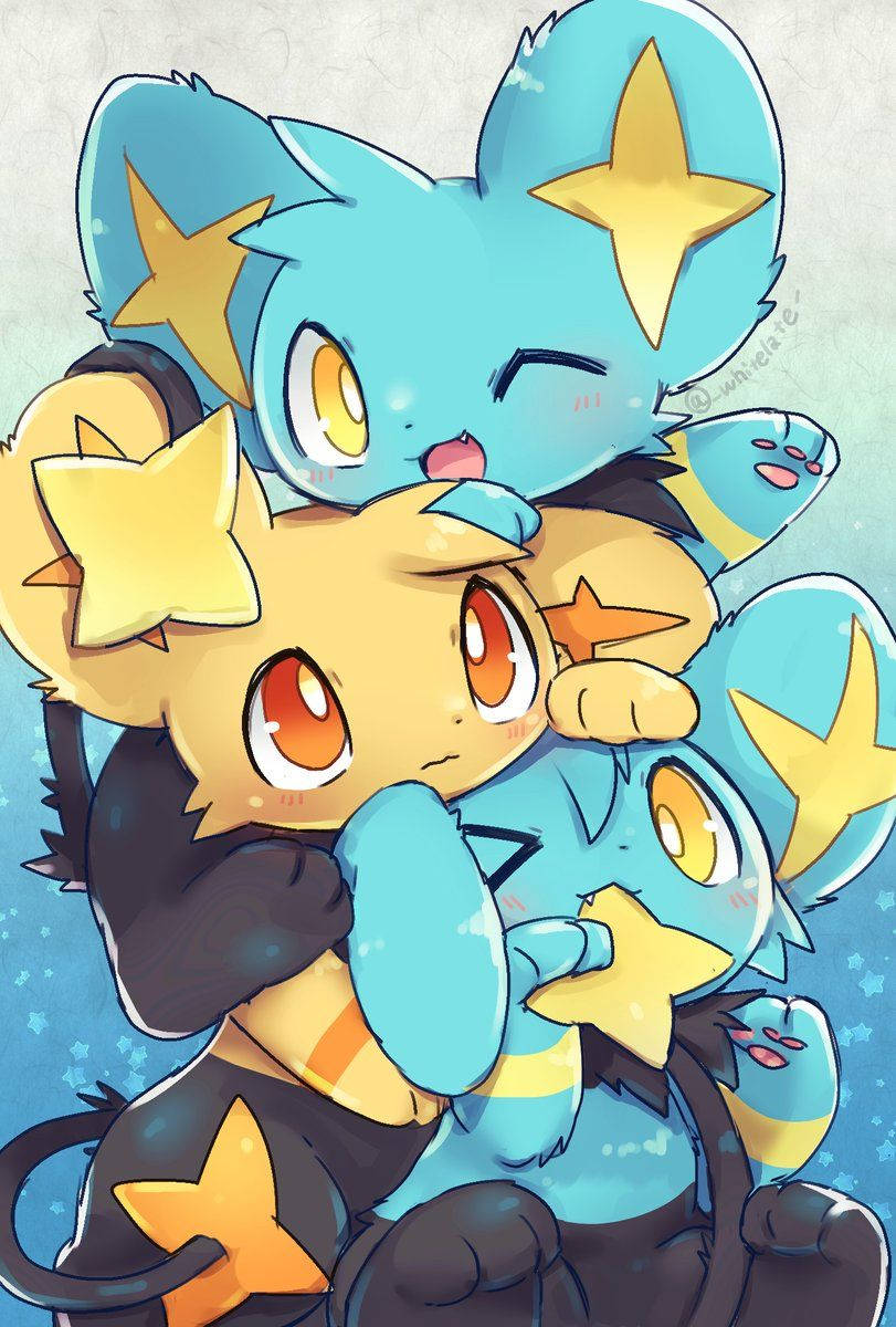 Shinx 桌布 壁紙 — 三隻可愛的星星主題寶可夢在柔和的藍色星空背景下擁抱在一起。