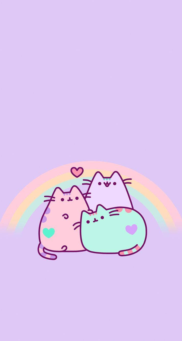 Kawaii iPhone 桌布 壁紙 — 三隻可愛的粉彩貓在彩虹下擁抱，心形在它們上方漂浮，背景是薰衣草色。