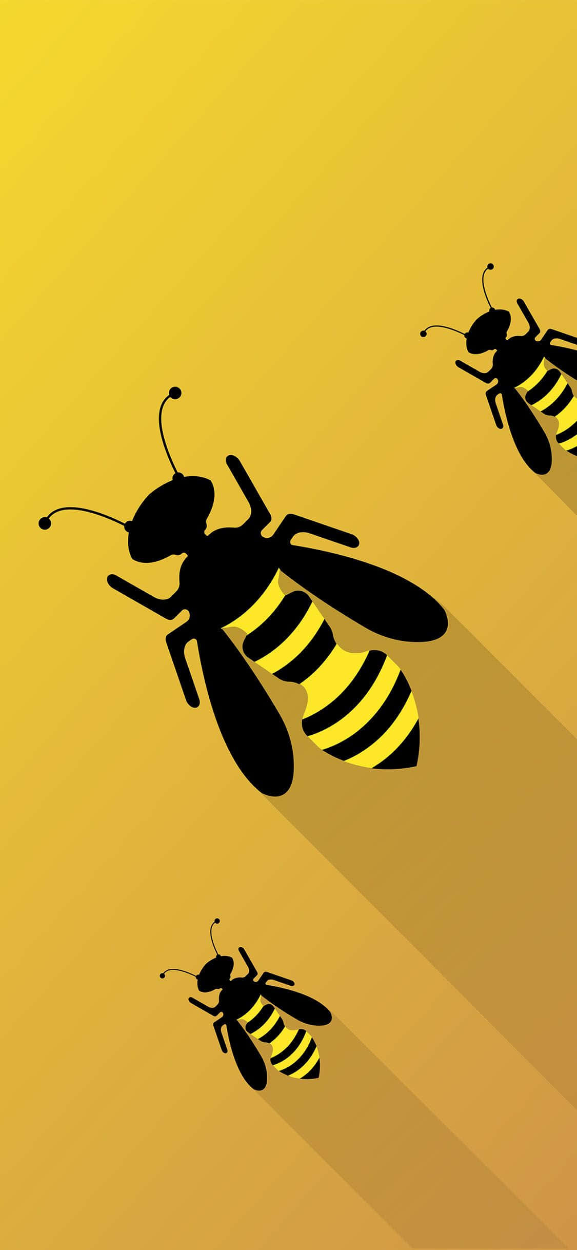 bees 桌布 壁紙 — 三隻帶有黑色和黃色條紋的風格化蜜蜂在溫暖的漸變黃色背景上對角飛翔，投下長長的陰影。