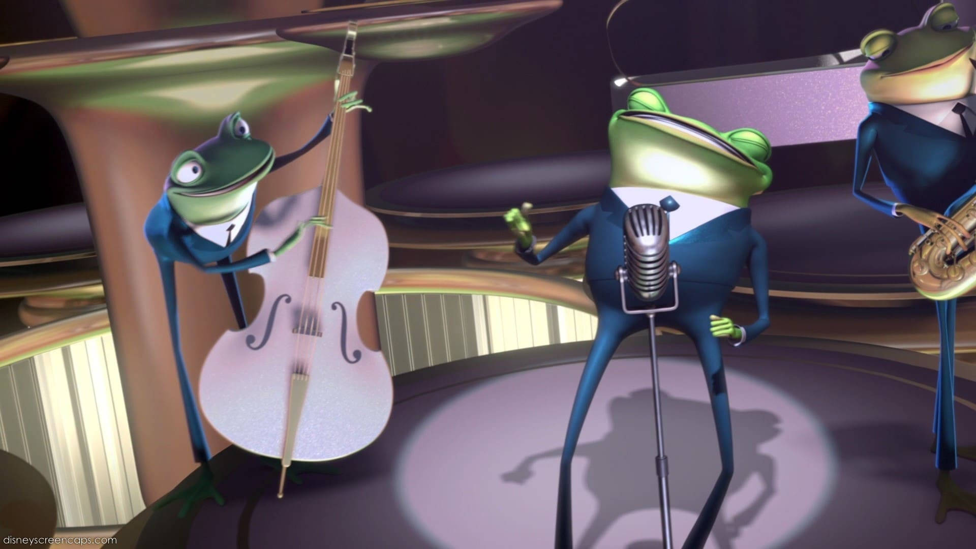 meet the robinsons 桌布 壁紙 — 三隻穿著西裝的動畫青蛙在舞台上表演，一隻青蛙拉大提琴並對著麥克風唱歌，另一隻在聚光燈下吹奏薩克斯風。
