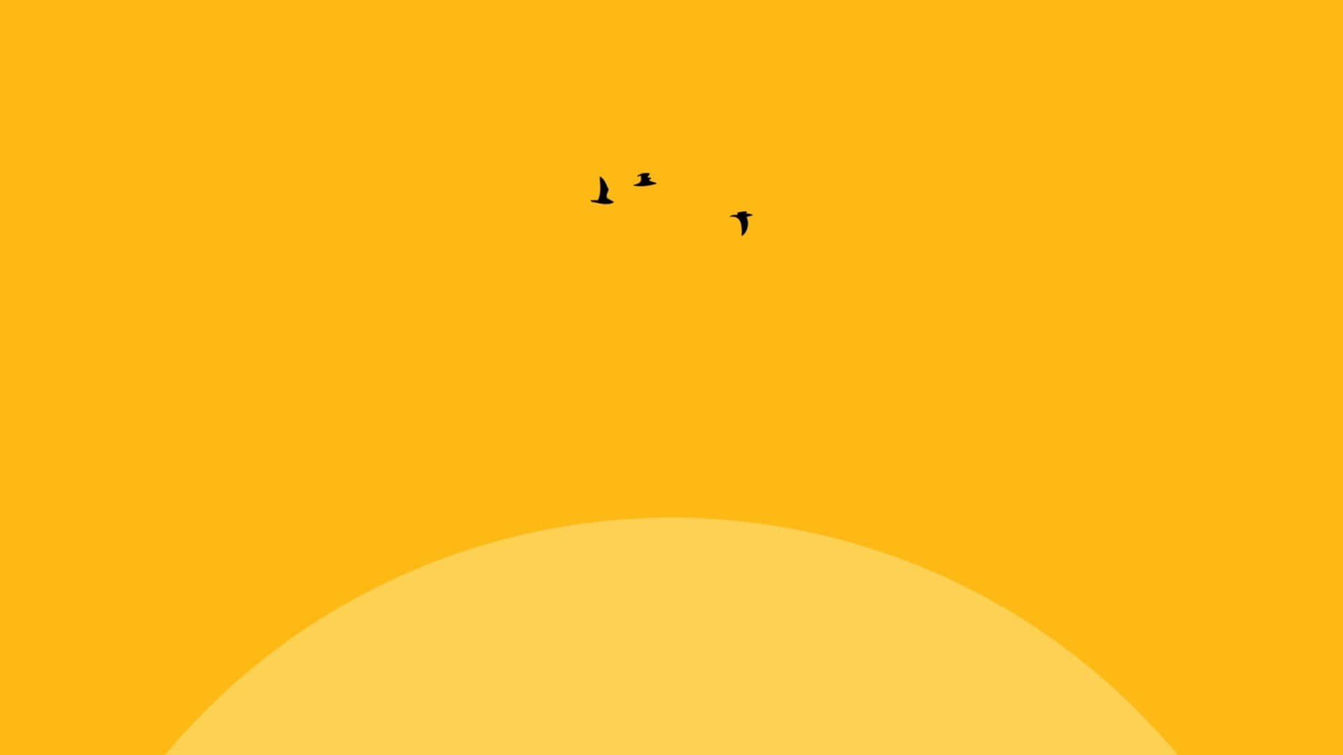 Yellow 桌布 壁紙 — 三隻黑鳥在彎曲的地平線上方，飛向漸變黃色的天空。