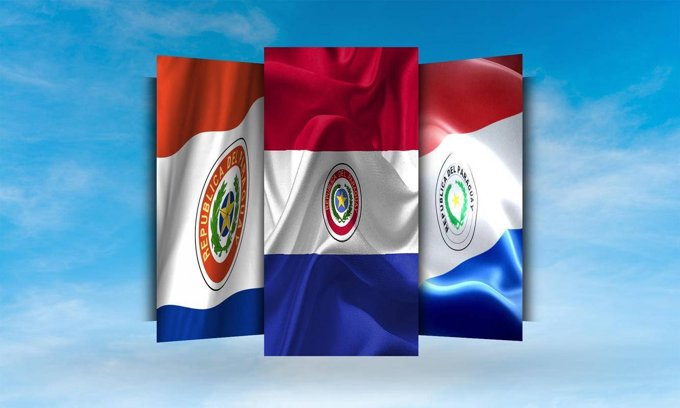 Paraguay 桌布 壁紙 — 三面飄揚的巴拉圭國旗帶有國徽，在明亮的藍天和薄雲中飄浮。