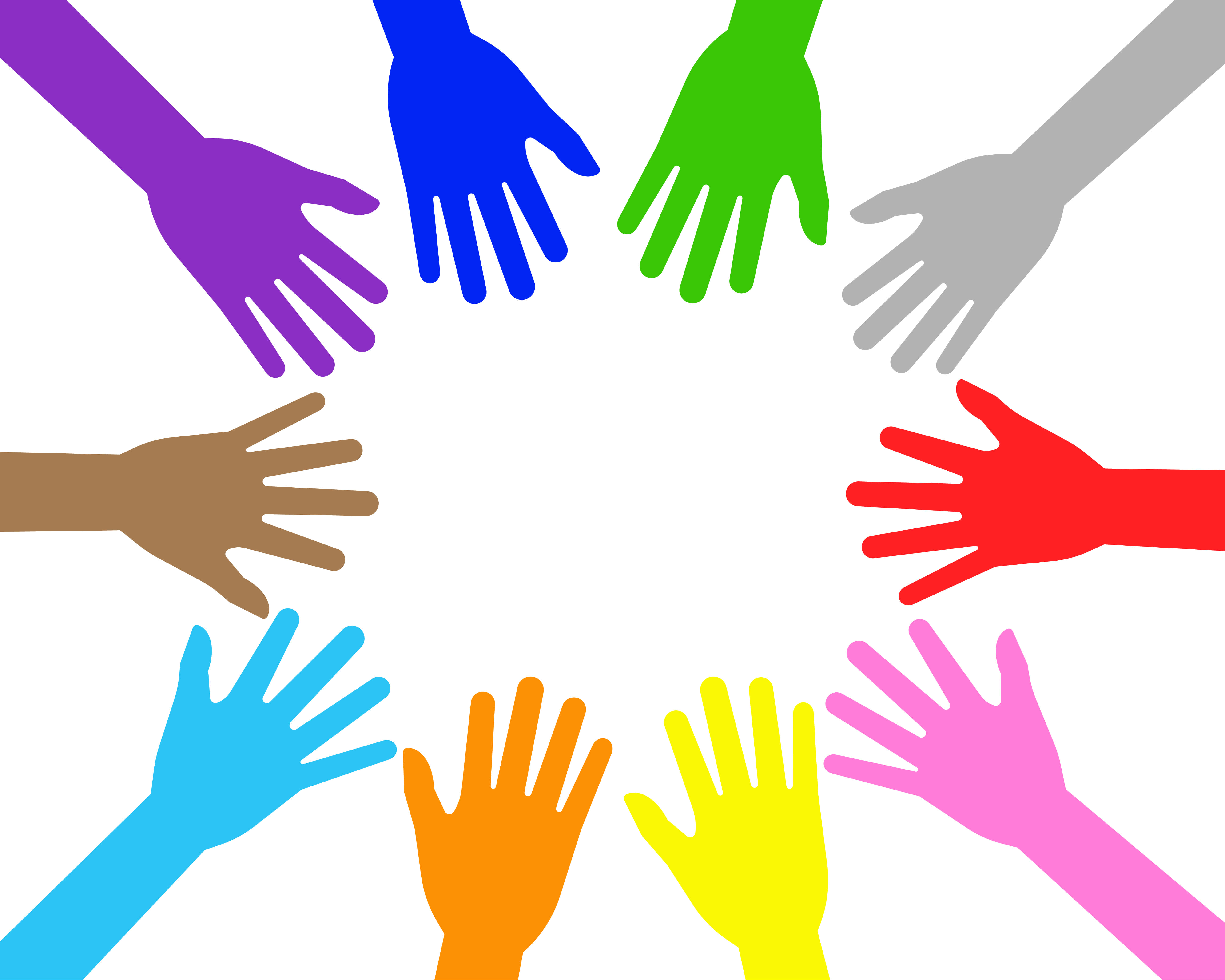 Teamwork 桌布 壁紙 — 不同膚色的鮮豔多彩手掌在白色背景上向內伸展成圓形。