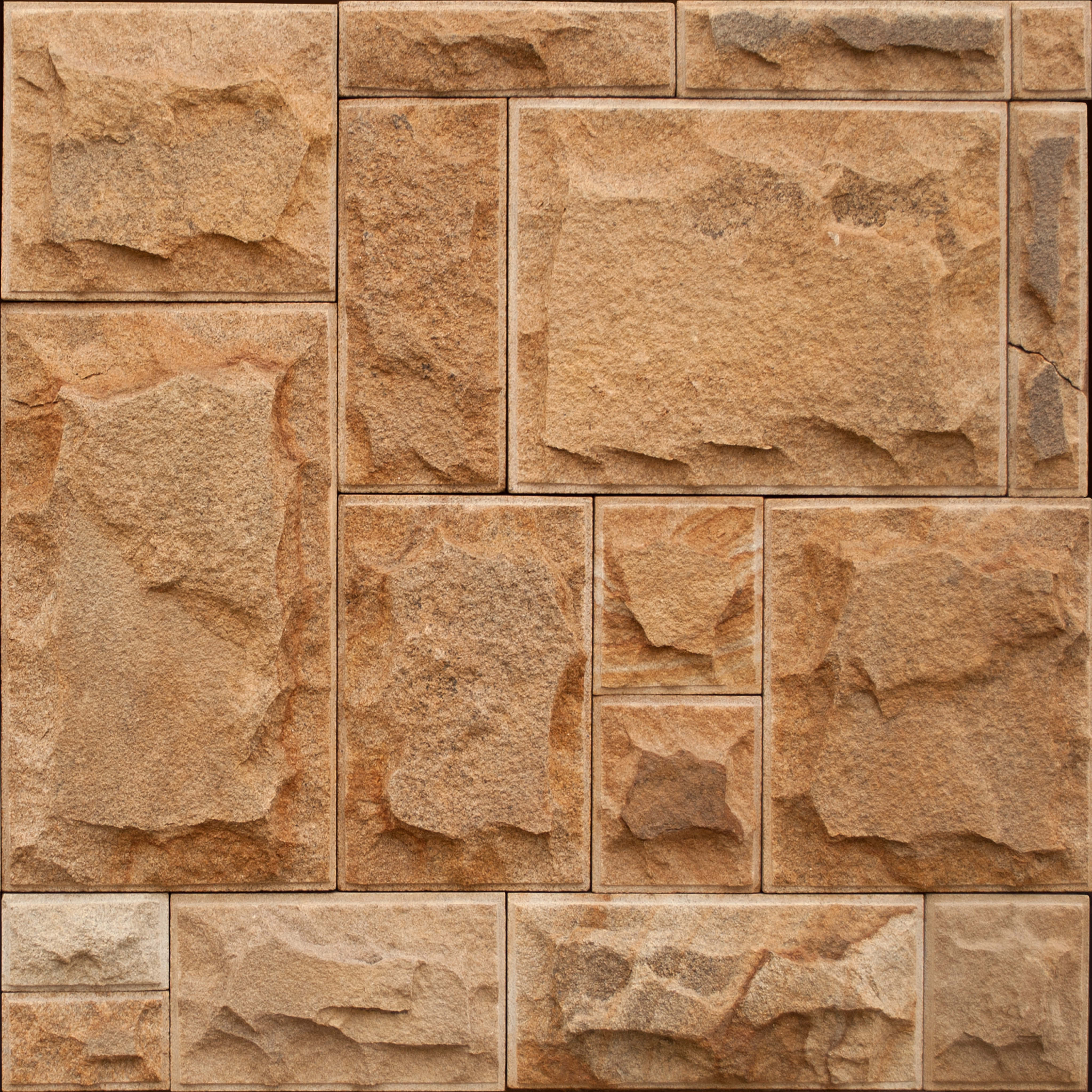 Tiles 桌布 壁紙 — 不規則形狀的米色石磚特寫，以自然紋理和大地色調排列成質樸的牆面圖案。