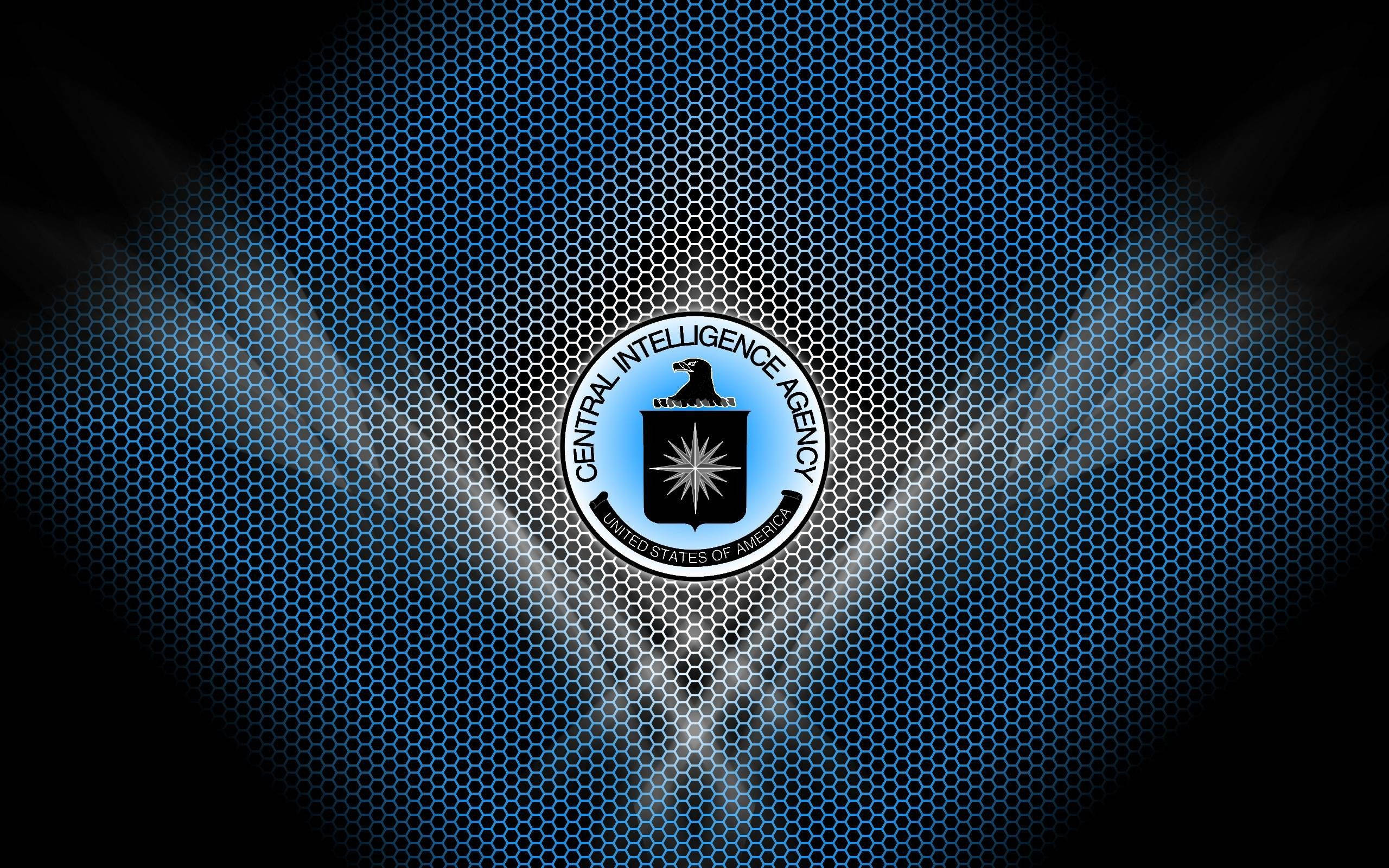 Cia 桌布 壁紙 — 中央情報局標誌居中於藍色六角形網格背景上，帶有發光效果。