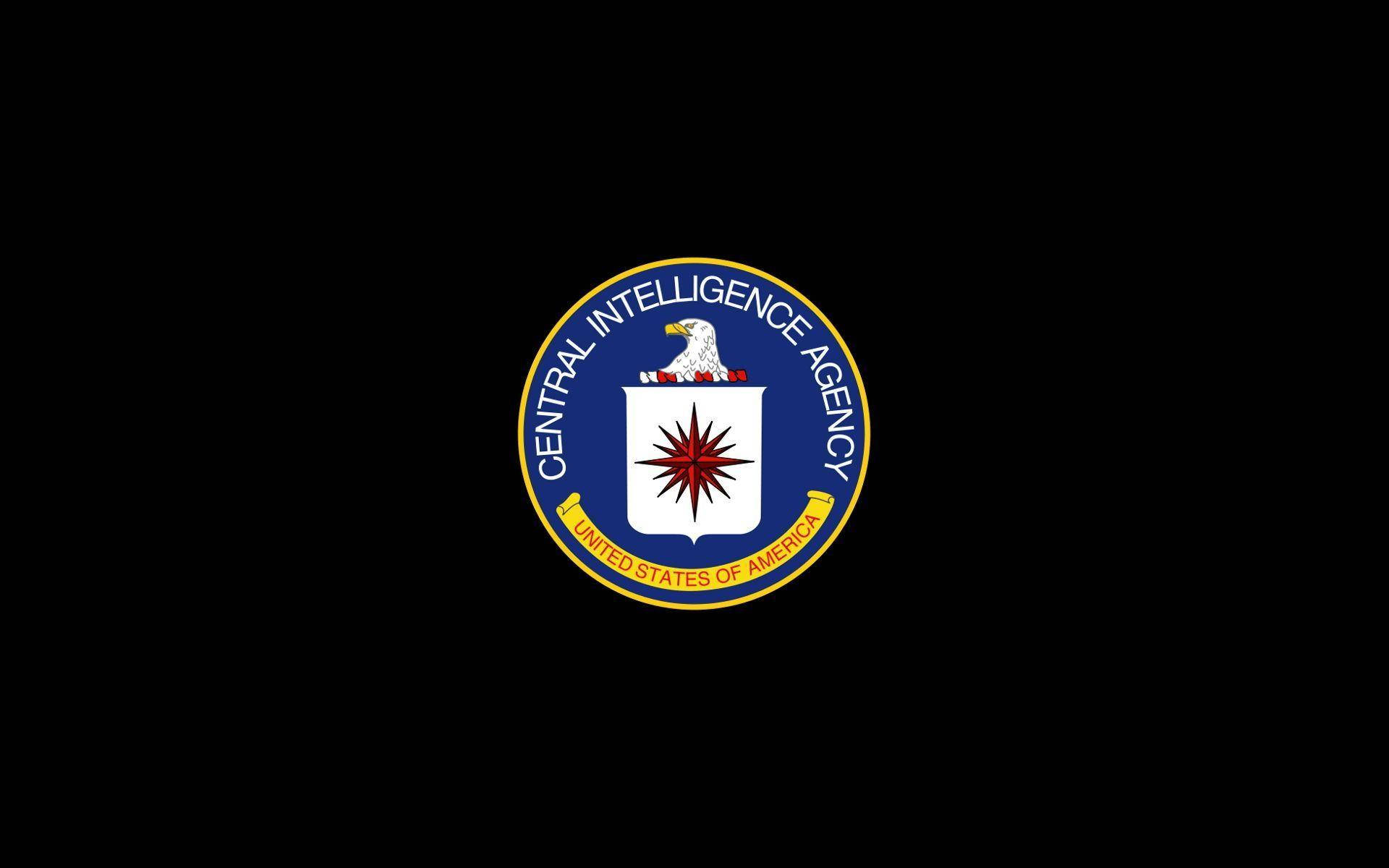 Cia 桌布 壁紙 — 中央情報局的官方印章居中於黑色背景上，帶有白色盾牌和紅色星爆。