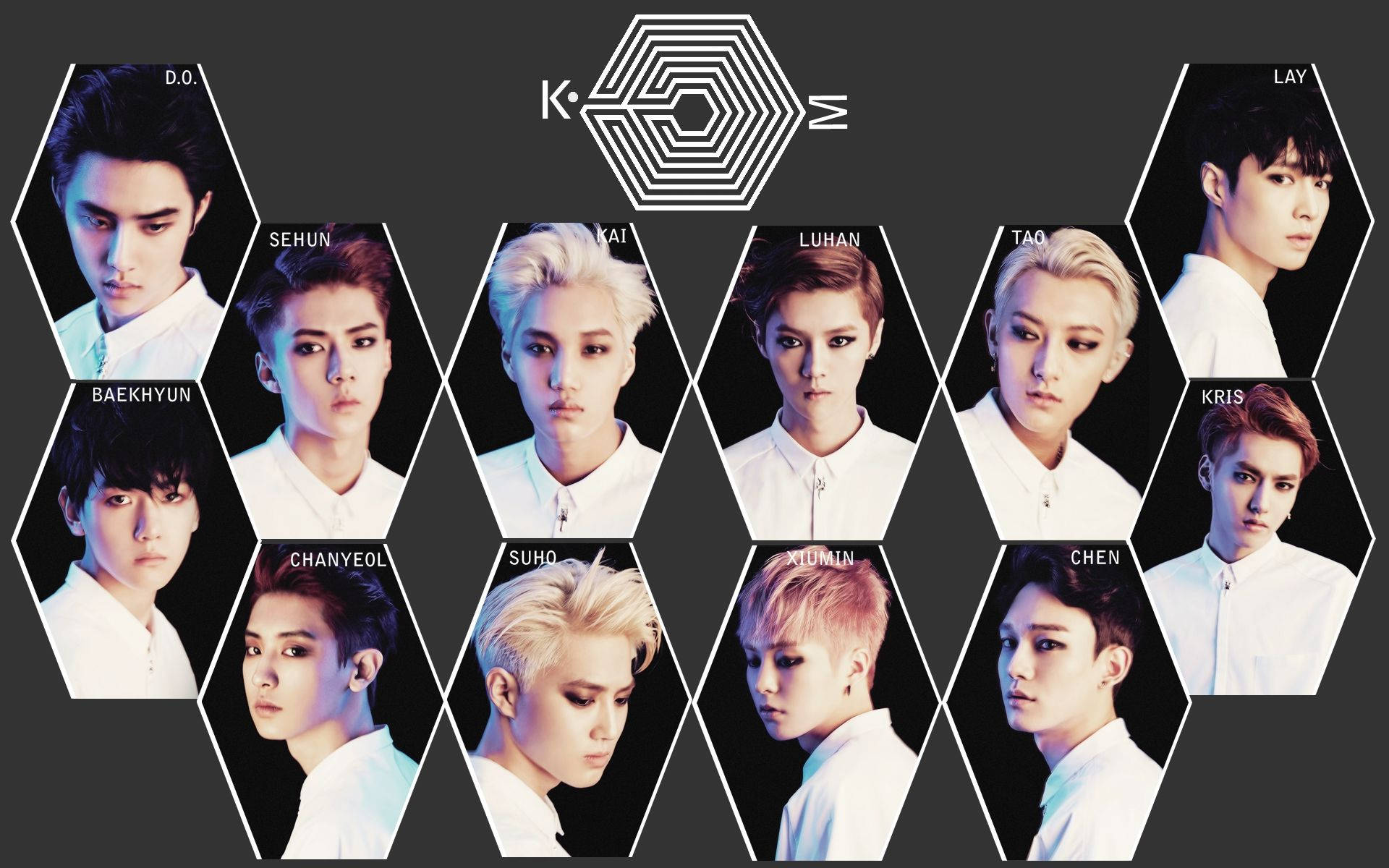 K-pop 桌布 壁紙 — 九位身穿白襯衫的K-pop偶像被六邊形框住，背景為深色，上方有一個幾何標誌。