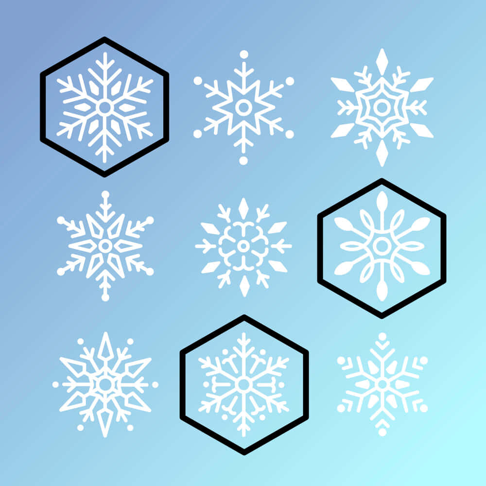 六邊形 桌布 壁紙 — 九個帶有六邊形輪廓的白色雪花圖示漂浮在柔和的漸變藍色背景上。