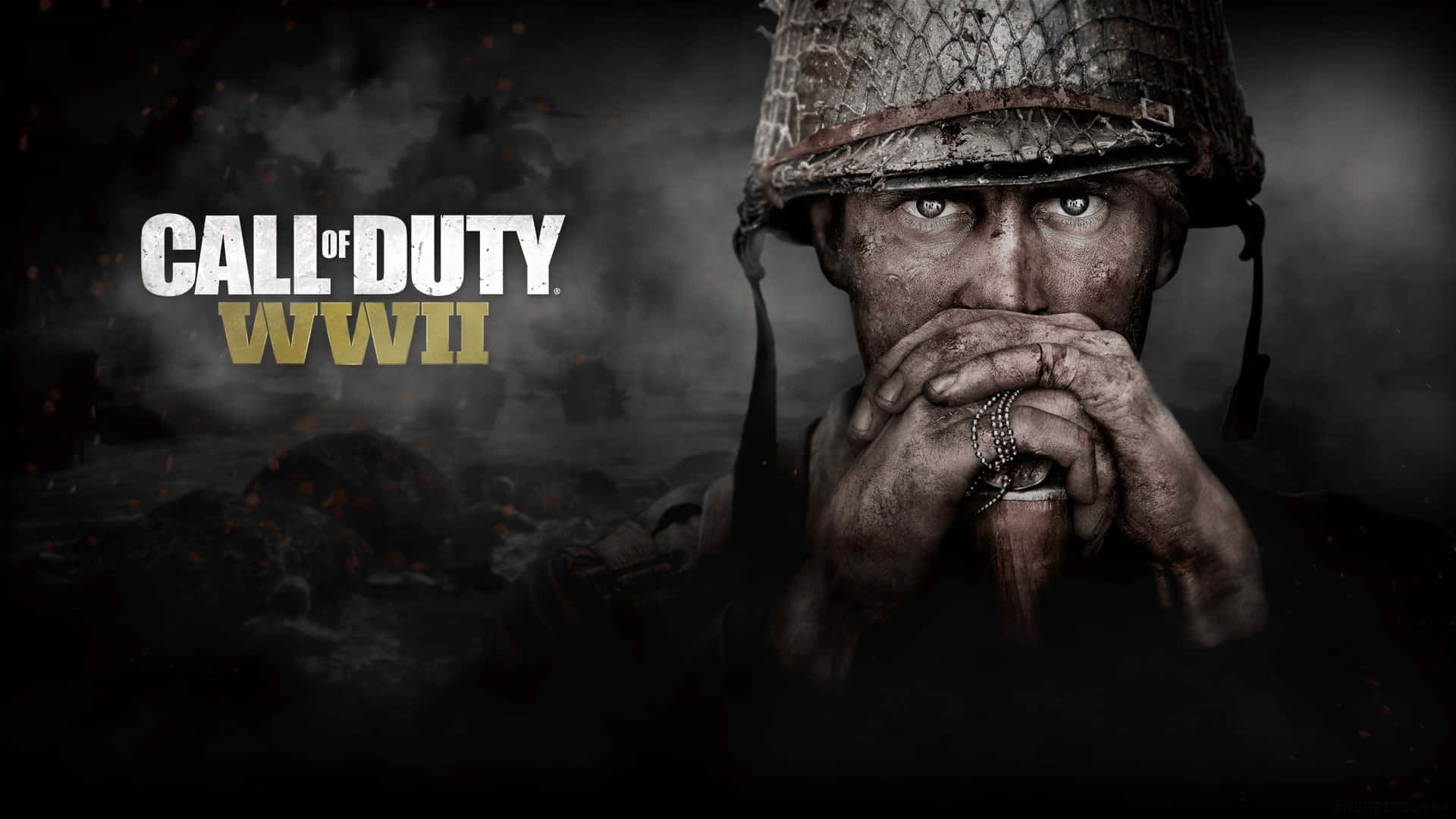 Call Of Duty Ps4 桌布 壁紙 — 二戰士兵戴頭盔緊握步槍的特寫，眼神銳利，背景是煙霧瀰漫的戰場。