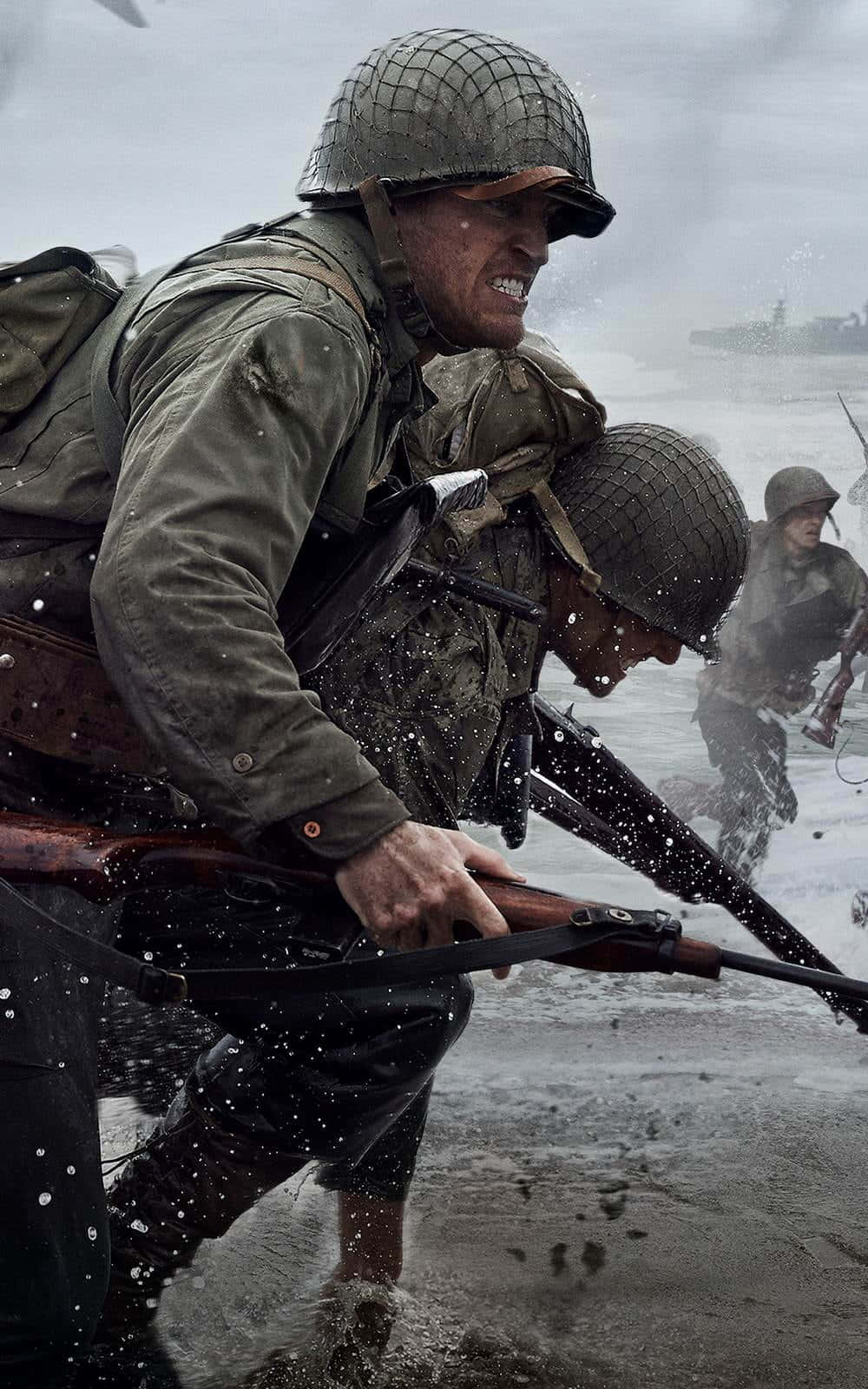 World War 2 桌布 壁紙 — 二戰裝備的士兵在灰色天空下，在激烈的海灘攻擊中涉過積雪的水域。