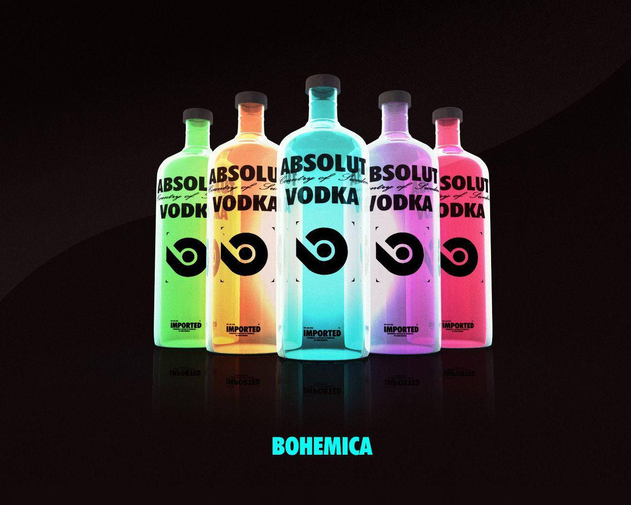 alcohol 桌布 壁紙 — 五個發光的Absolut Vodka瓶子以霓虹色彩排列在黑暗的反射表面上，下方有'BOHEMICA'文字。