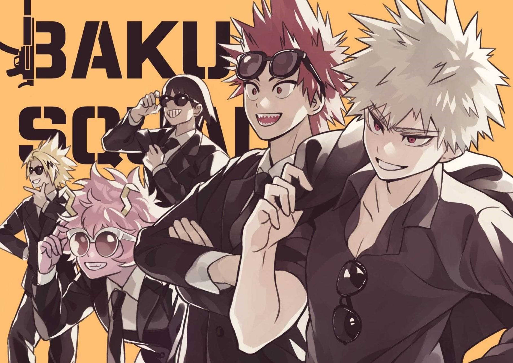 Bakusquad 桌布 壁紙 — 五個身穿黑色西裝和太陽眼鏡的動漫角色，在帶有「BAKU」文字的鮮豔橙色背景前擺出自信姿勢。