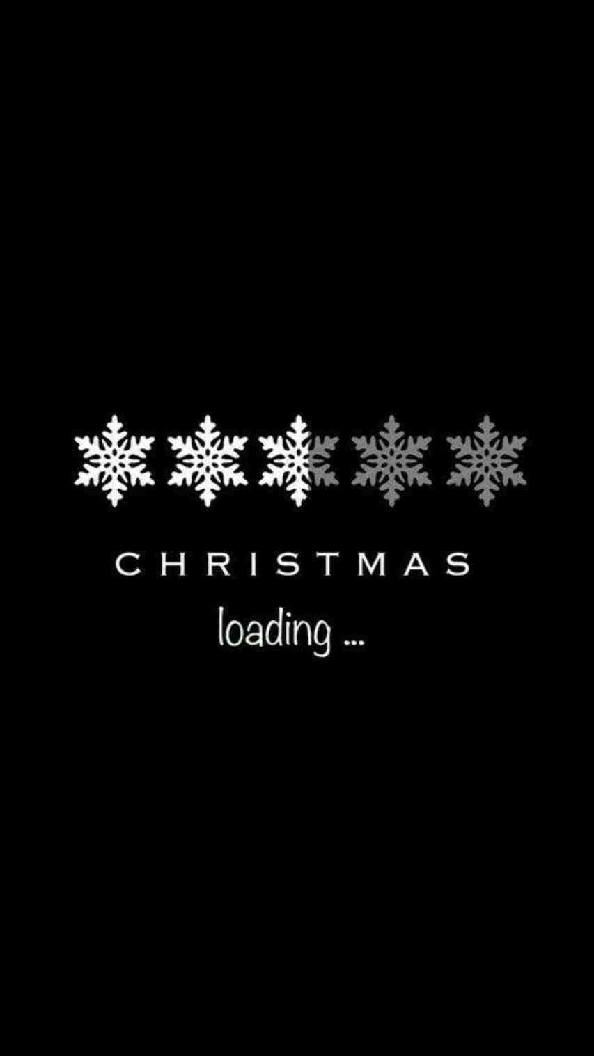 Dark Christmas 桌布 壁紙 — 五片白色雪花懸浮在黑色背景上的「Christmas loading」文字上方。