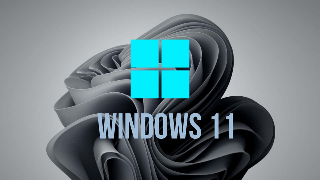 Eligible 桌布 壁紙 — 亮青色 Windows 11 標誌漂浮在旋轉的深灰色抽象形狀上，背景為柔和的灰色。