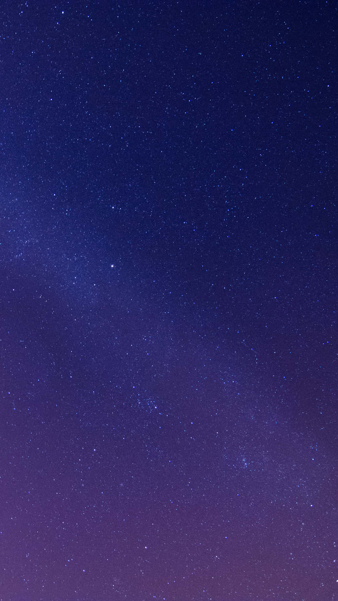 Aesthetic Night Sky 桌布 壁紙 — 令人嘆為觀止的星空夜景，從深藍色過渡到紫色，無數閃爍的星星點綴其中。