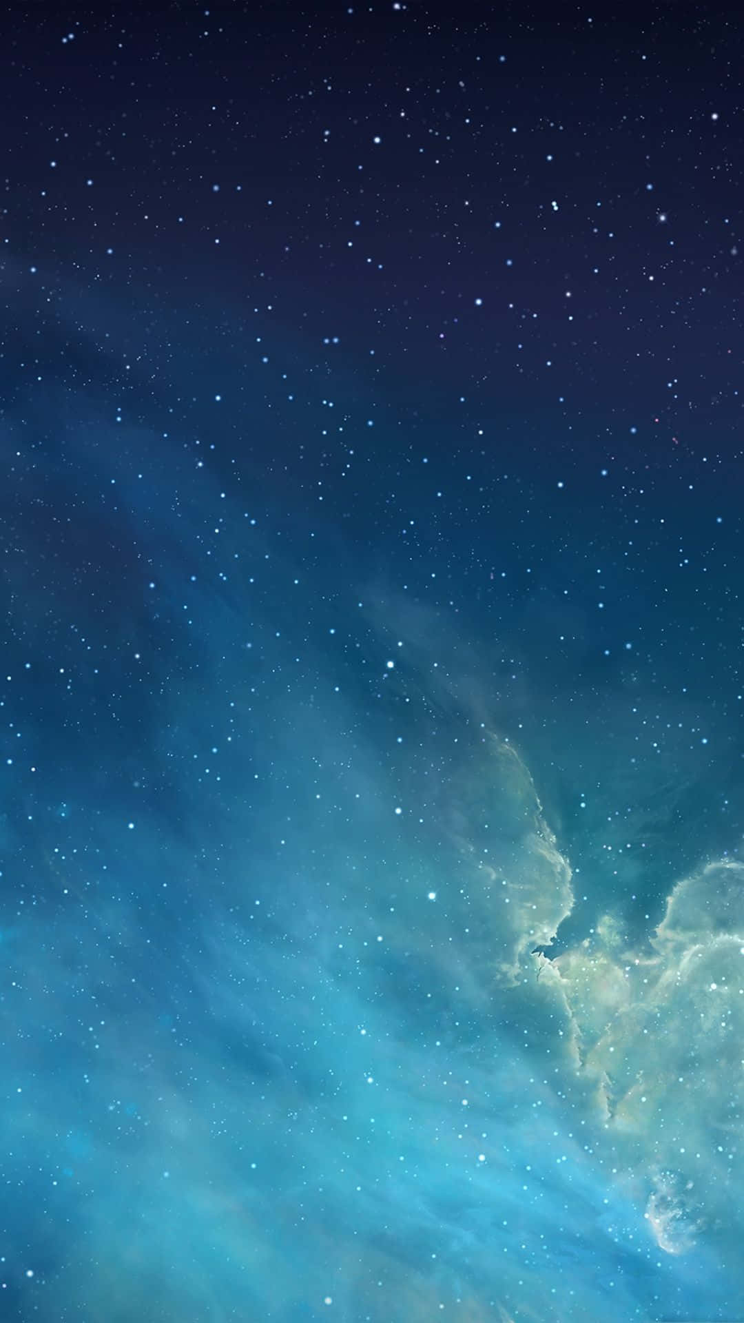 桌布 壁紙 — 令人嘆為觀止的星空夜景，有旋轉的藍色和藍綠色星雲以及發光的宇宙雲。