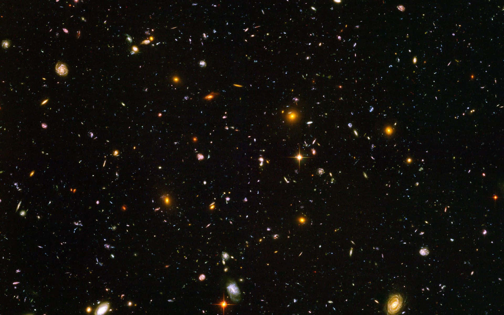 Telescope 桌布 壁紙 — 令人嘆為觀止的景色，無數星系和恆星散落在深邃的太空黑暗中。