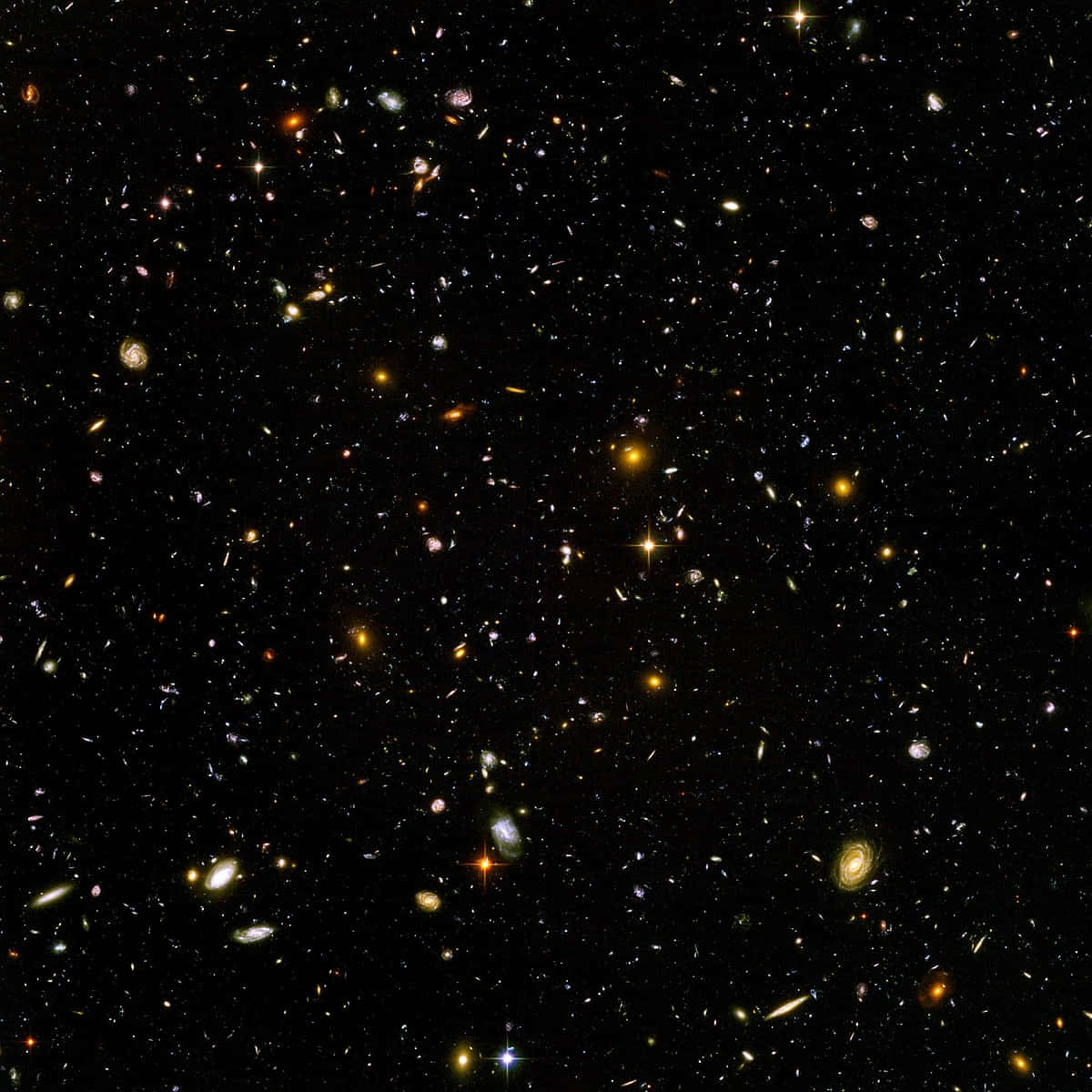 太空 桌布 壁紙 — 令人嘆為觀止的景色，無數星系和恆星散佈在深邃的黑色太空中。