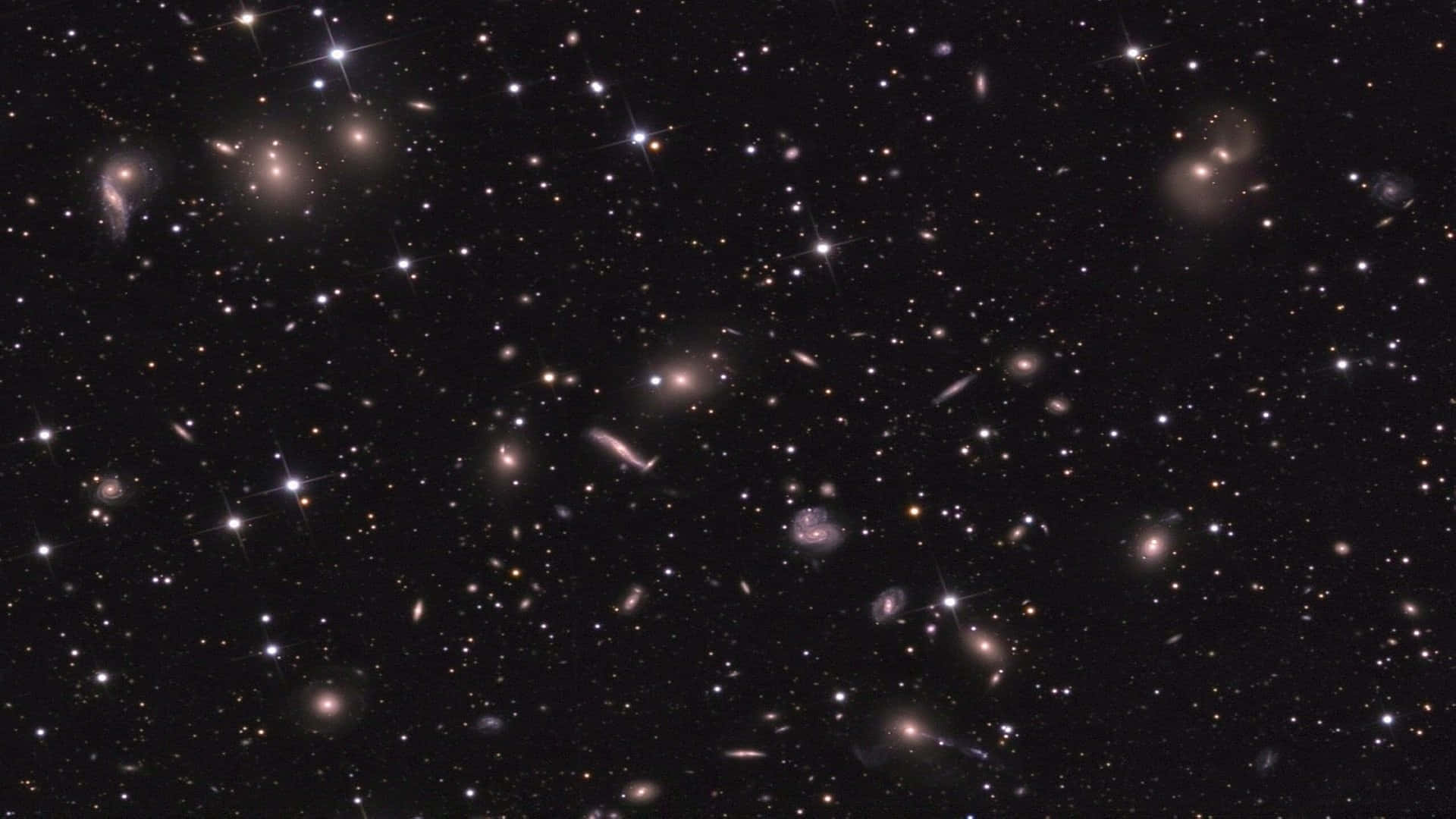 Interstellar Travel 桌布 壁紙 — 令人嘆為觀止的深空景觀，充滿無數恆星和遙遠星系，在黑色虛空中閃耀。