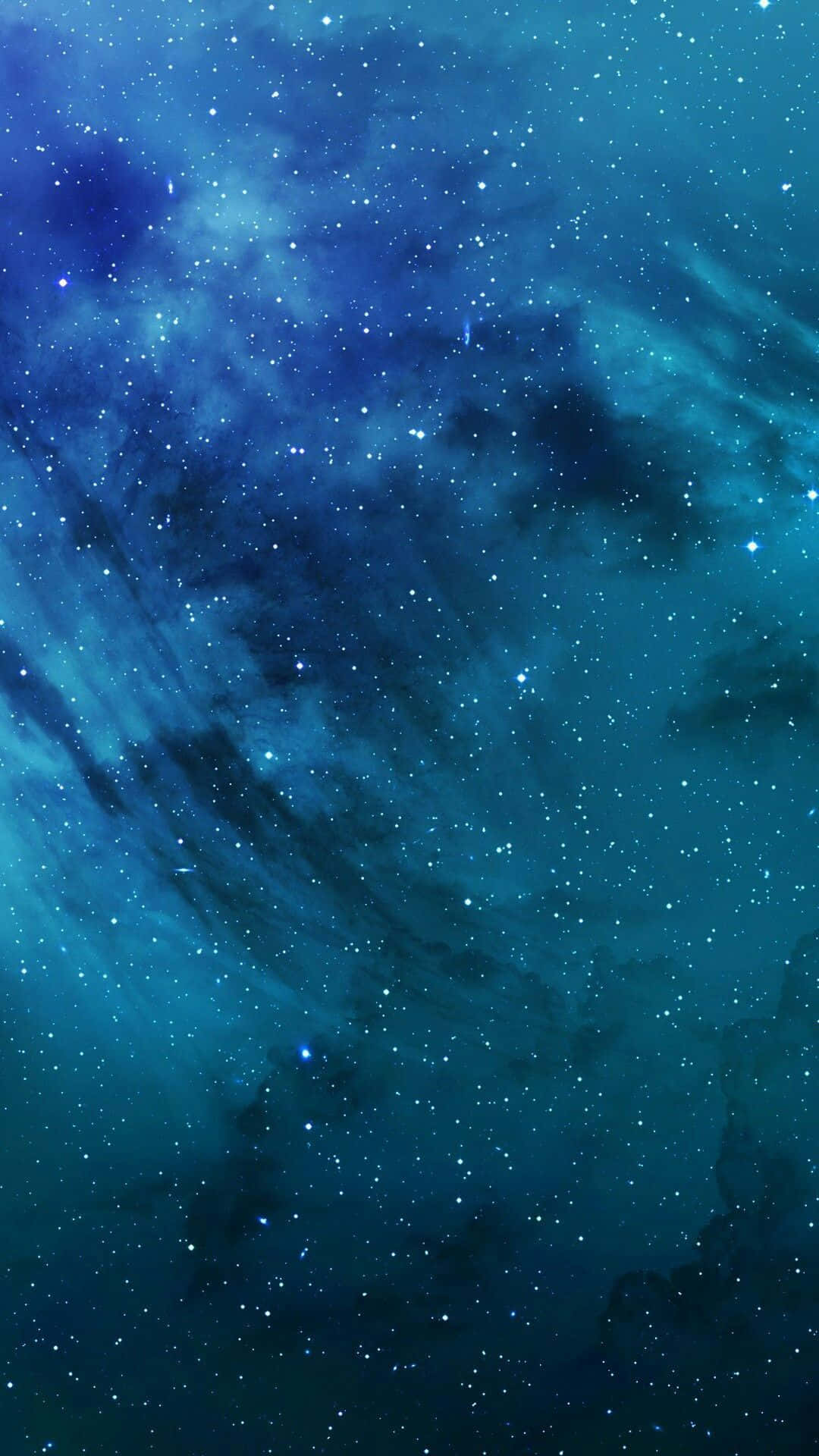Galaxy Blue Aesthetic 桌布 壁紙 — 令人嘆為觀止的深藍色宇宙星雲景觀，充滿發光的星星和旋轉的宇宙塵埃。