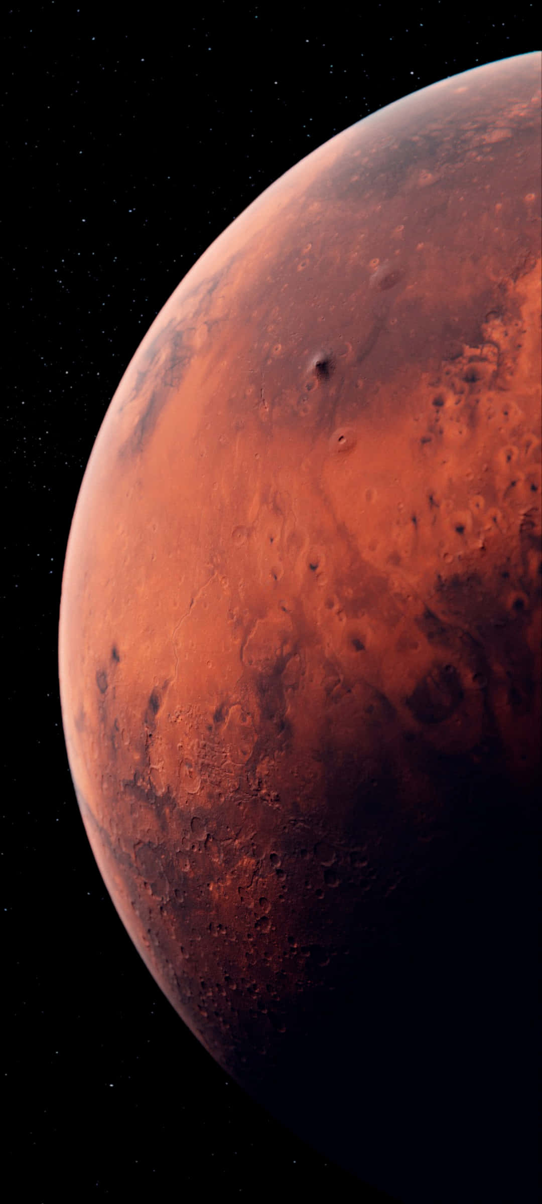 火星 桌布 壁紙 — 令人嘆為觀止的火星景象，在繁星點點的黑色天空中發出紅光，可見隕石坑和山谷。