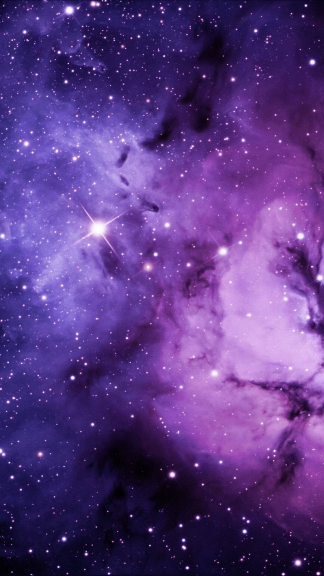 漂亮美學 桌布 壁紙 — 令人嘆為觀止的紫色星雲景象，充滿閃爍的星星和宇宙塵埃雲。