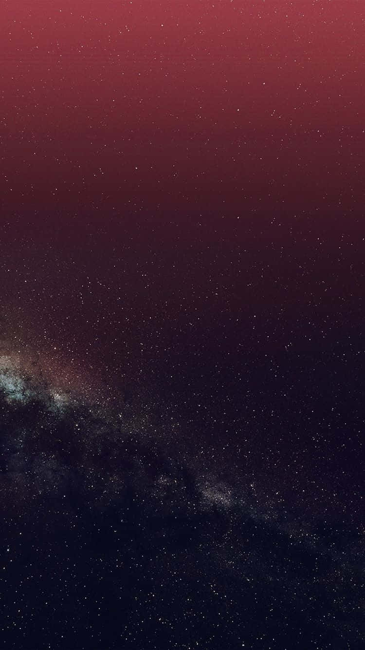 Stars 桌布 壁紙 — 令人嘆為觀止的銀河系景觀，在深紅和靛藍色的宇宙天空中閃爍著星星。