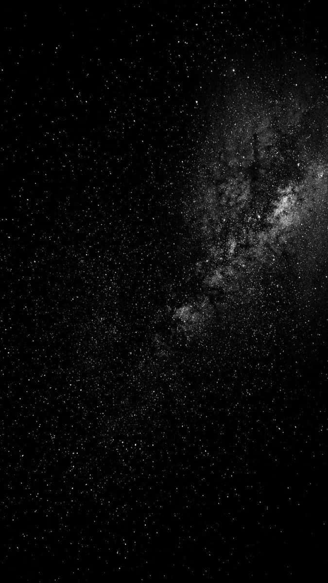 夜空 桌布 壁紙 — 令人嘆為觀止的銀河系景觀，在深邃的黑色宇宙天空中閃爍著無數星星。
