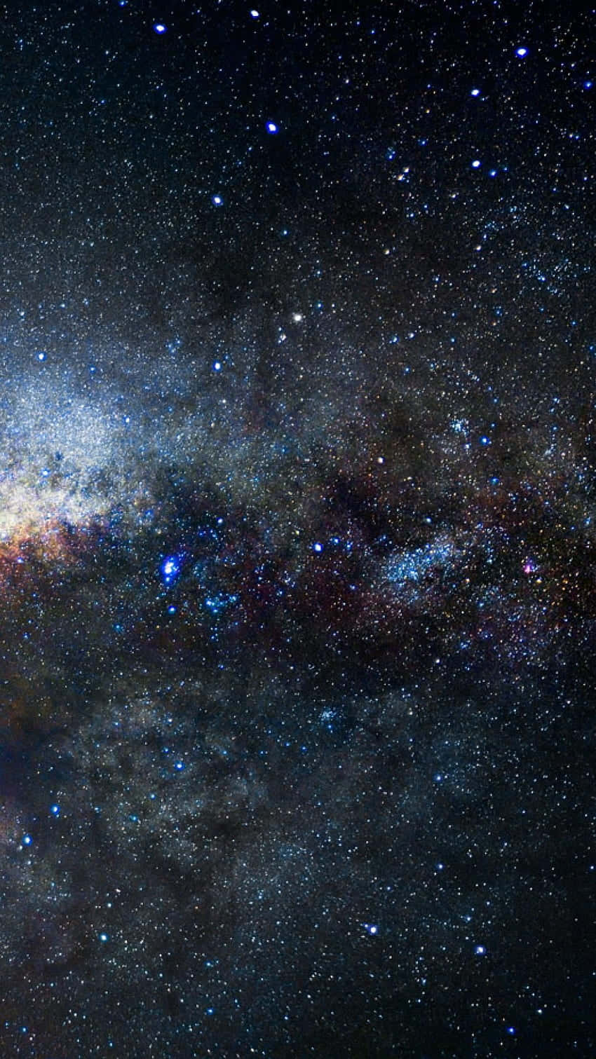 Hipster Galaxy Tumblr 桌布 壁紙 — 令人嘆為觀止的銀河系景觀，藍色和橙色的星雲在繁星點點的宇宙夜空中閃耀。
