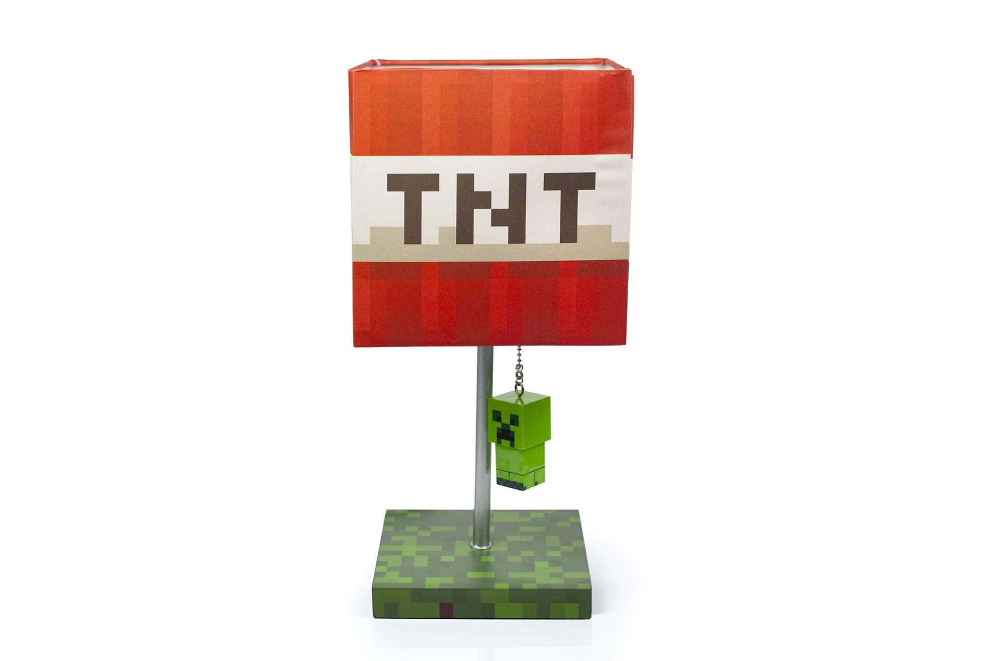 我的世界 TNT 桌布 壁紙 — 以Minecraft為主題的桌燈，帶有紅色TNT圖案的燈罩和懸掛在像素化綠色底座上的Creeper公仔。