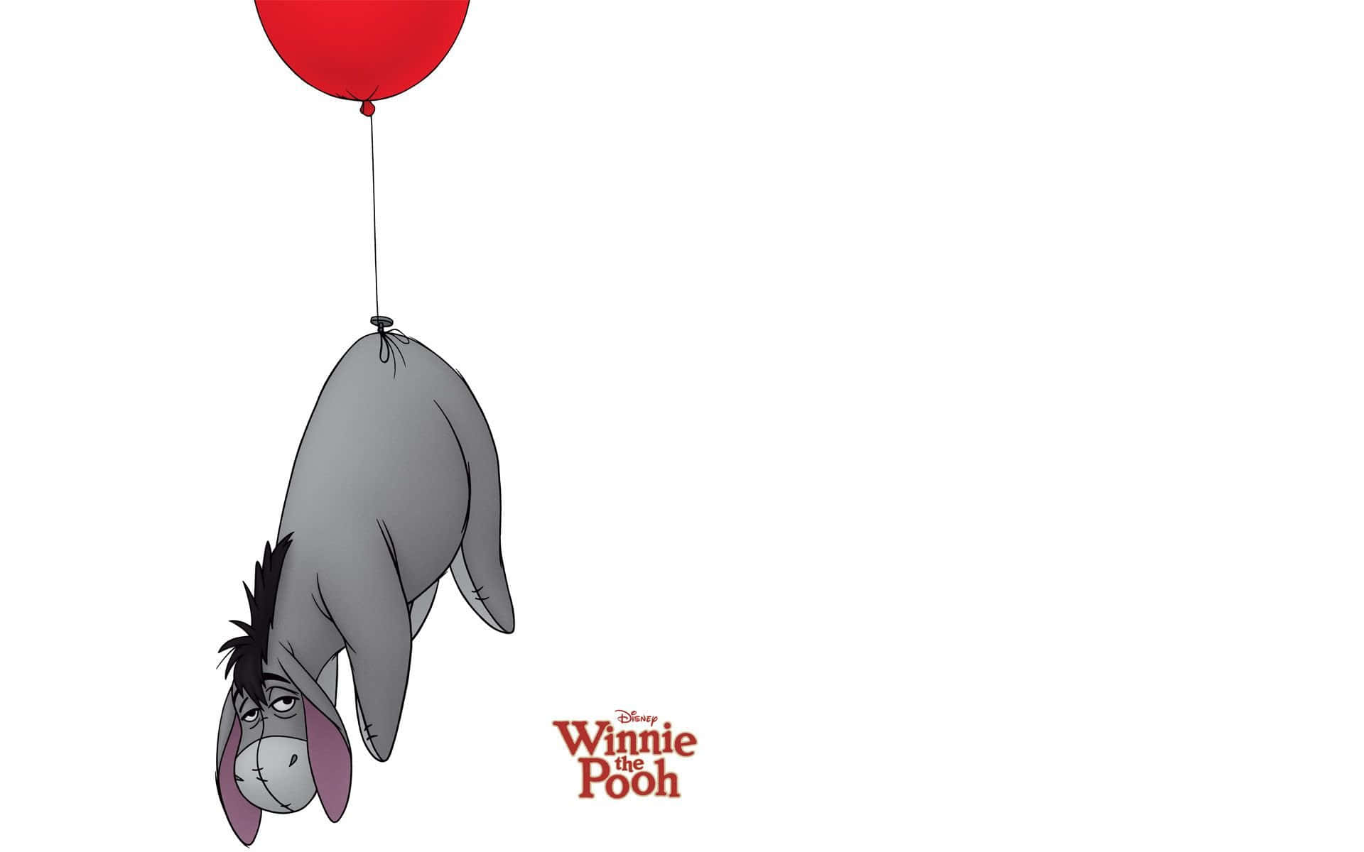 winnie the pooh 桌布 壁紙 — 伊唷用紅色氣球倒吊在純白色背景上，帶有迪士尼小熊維尼標誌。