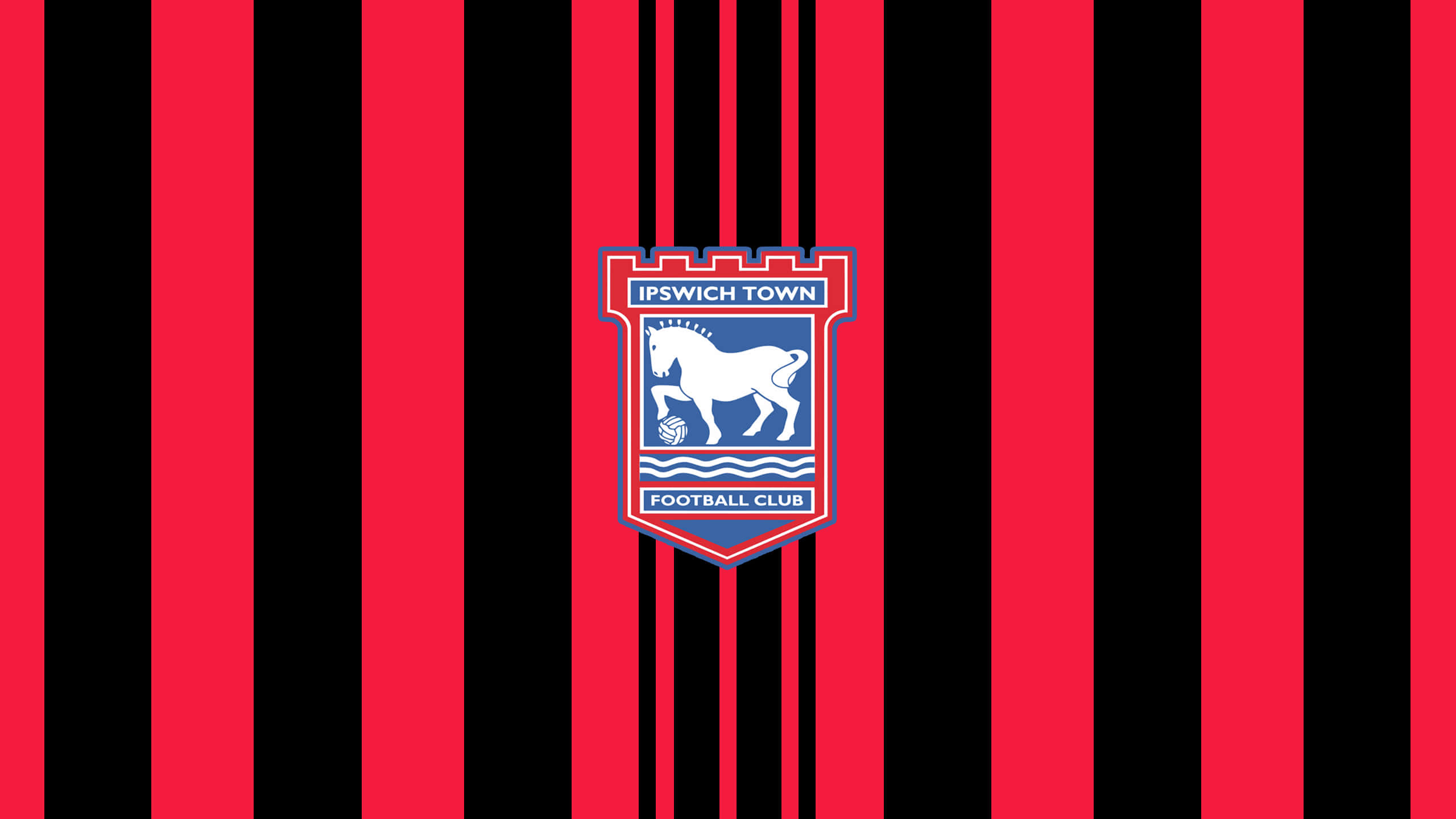 Ipswich Town 桌布 壁紙 — 伊普斯維奇鎮足球俱樂部徽章置於大膽的紅黑垂直條紋中央。
