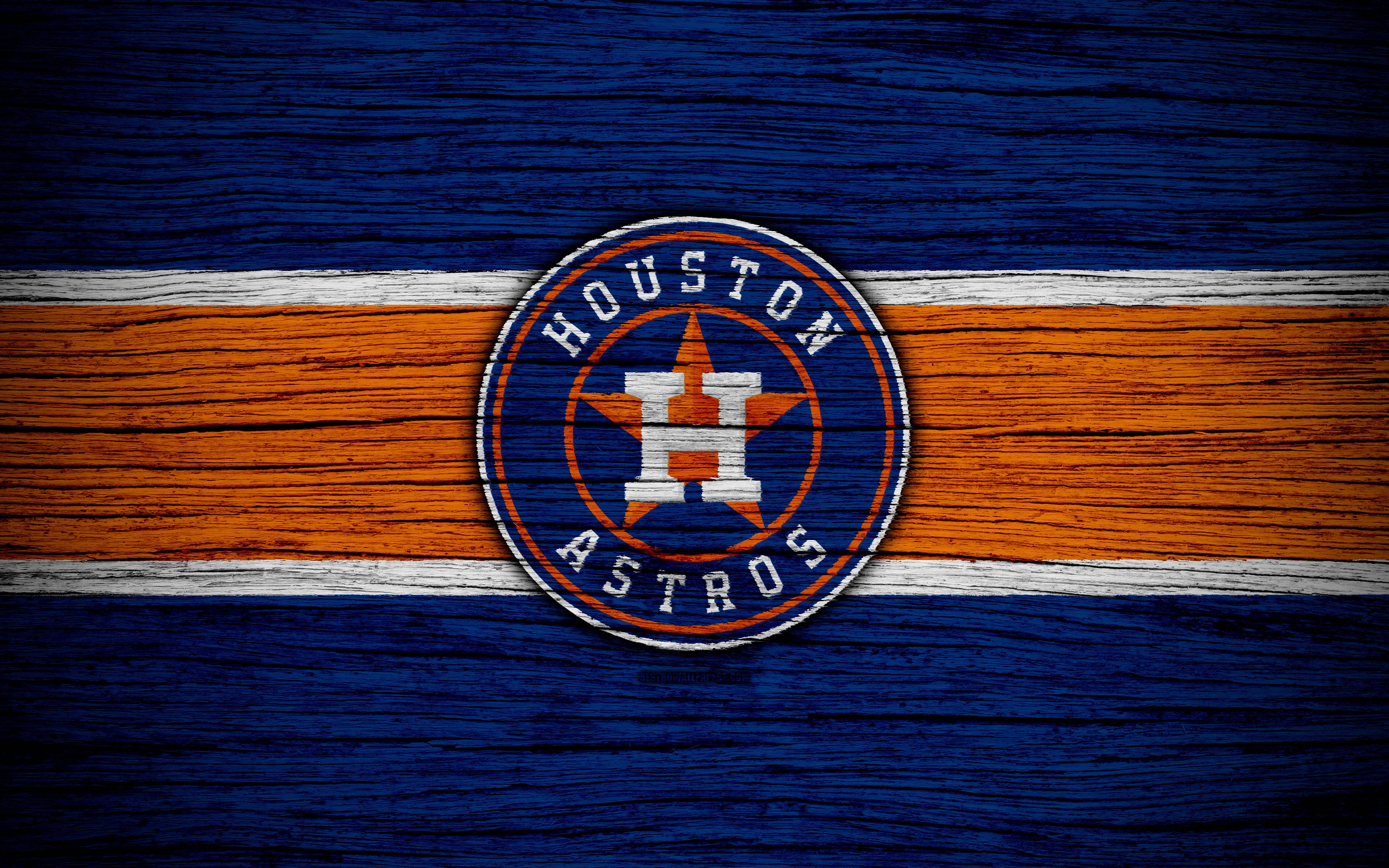 Astros 桌布 壁紙 — 休士頓太空人標誌居中於藍色和橙色木紋紋理背景上，帶有白色條紋。