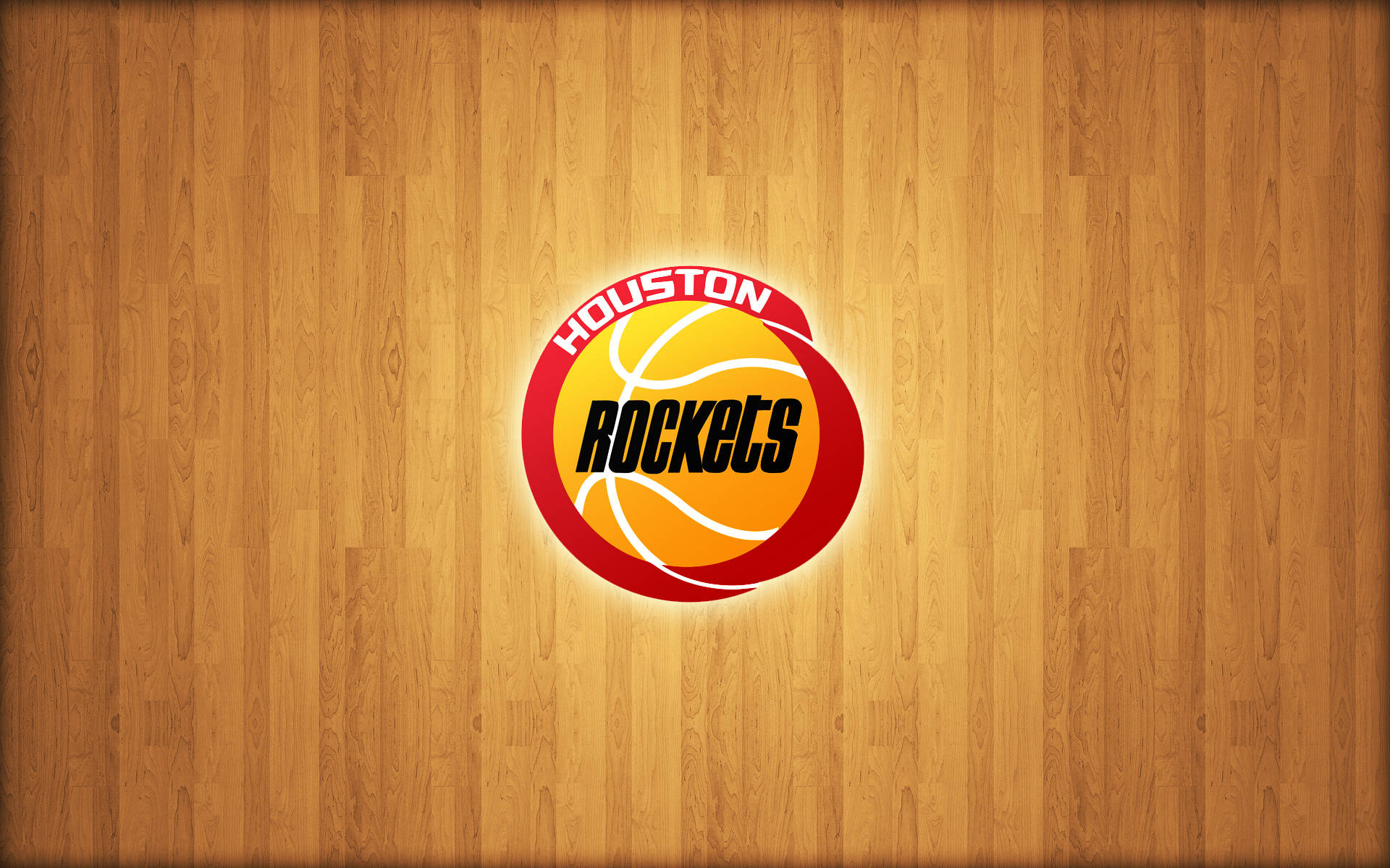 Houston Rockets 桌布 壁紙 — 休士頓火箭隊標誌在拋光木製籃球場地板上發光。